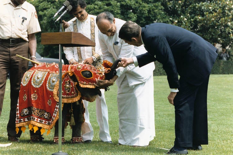 President Jayewardene of Sri Lanka presents a baby elephant to President Reagan in 1984
