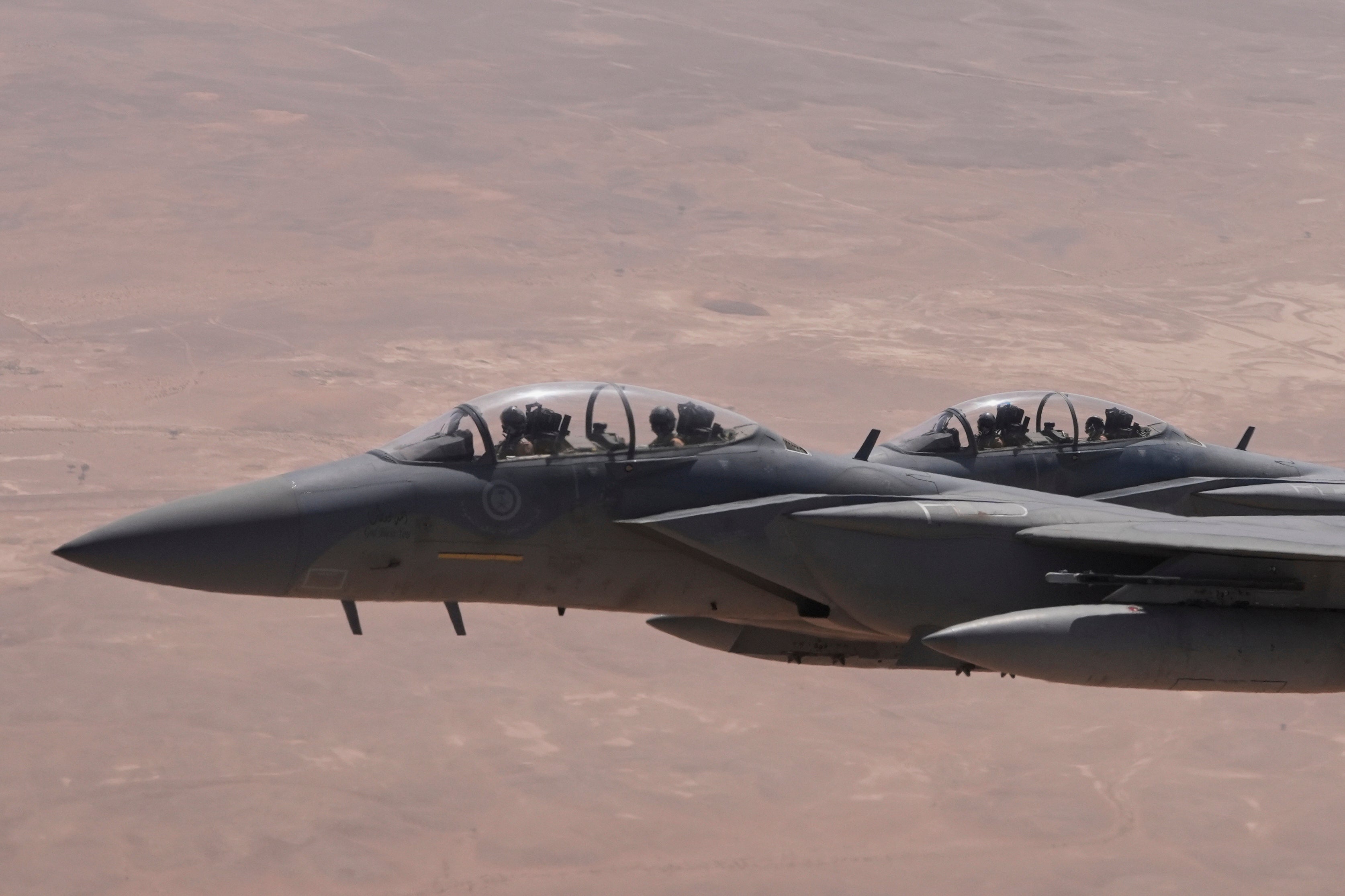 Royal Saudi Air Force F-15s provide an honorary escort for Air Force One, with President Donald Trump aboard, as it arrives in Saudi Arabia.