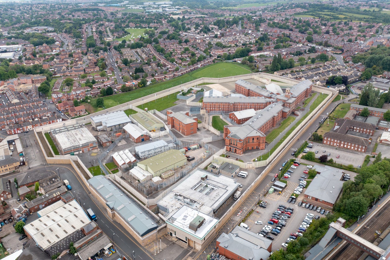 Aerial drone footage of the town centre of Wakefield in West Yorkshire showing the main building and walls of the prison