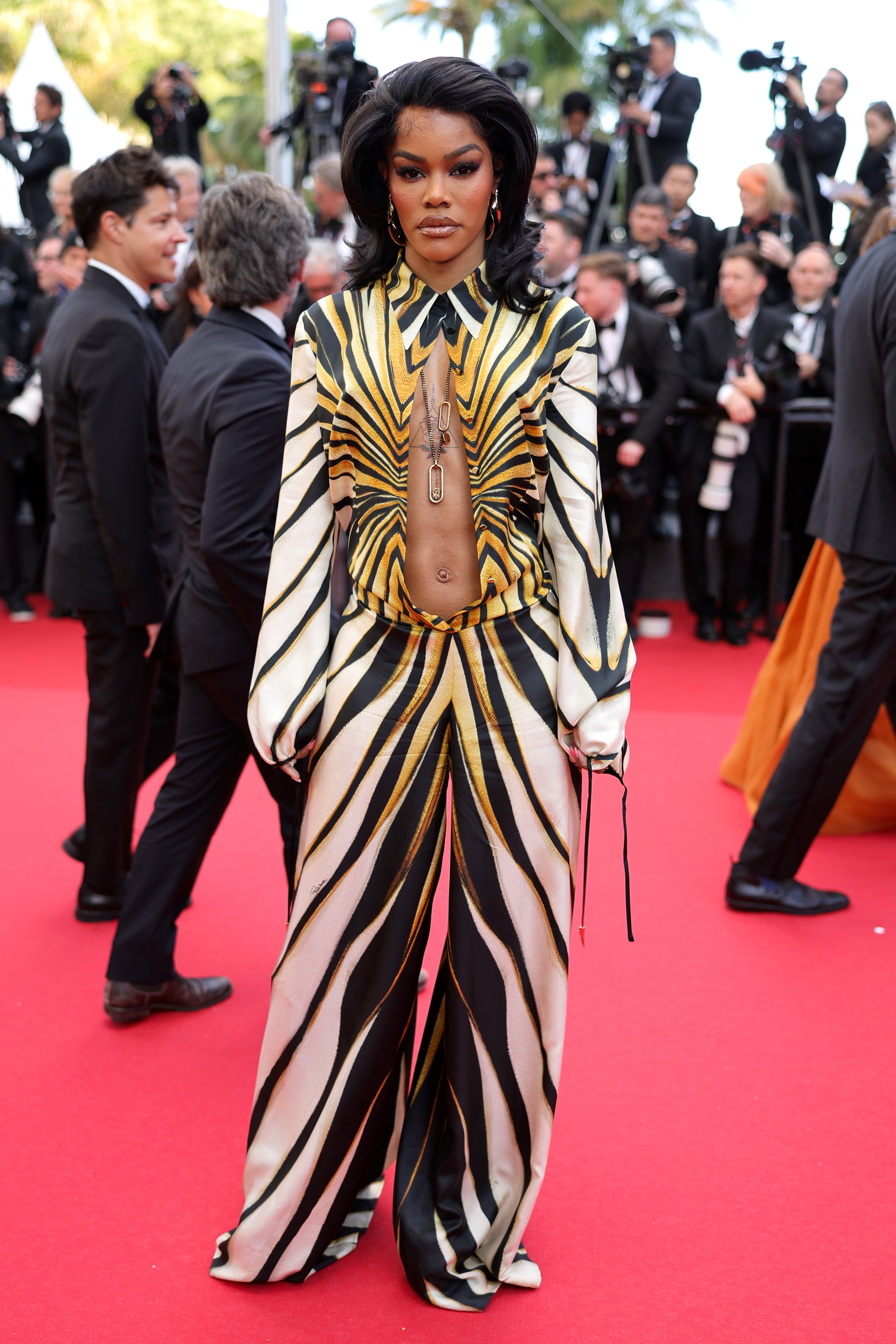 Singer-songwriter Teyana Taylor showed up to the 2024 Cannes Film Festival in a Roberto Cavalli zebra-print gown