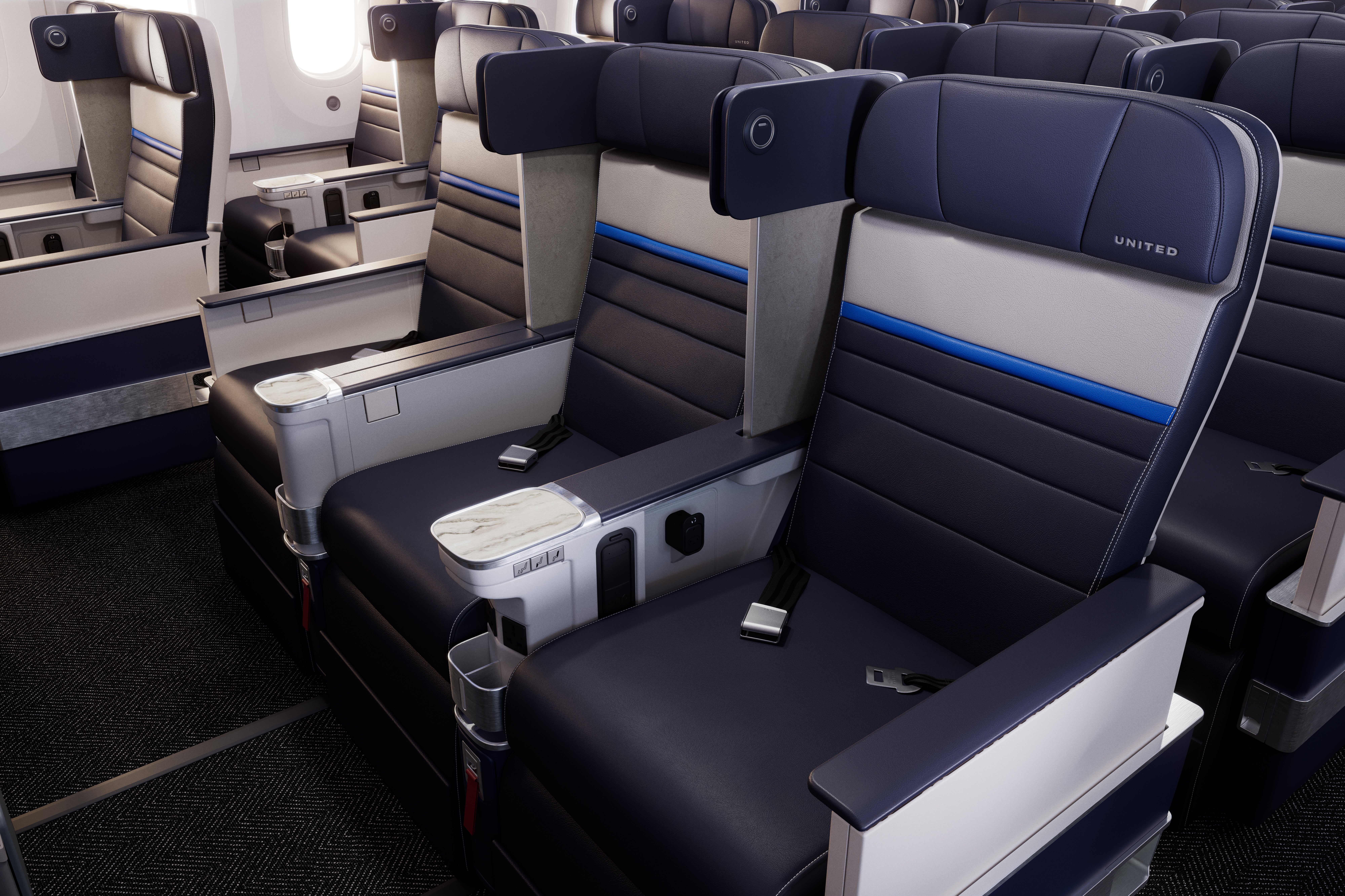 The new premium economy seats are slightly wider and feature 16-inch 4K screens (up from 13 inches)