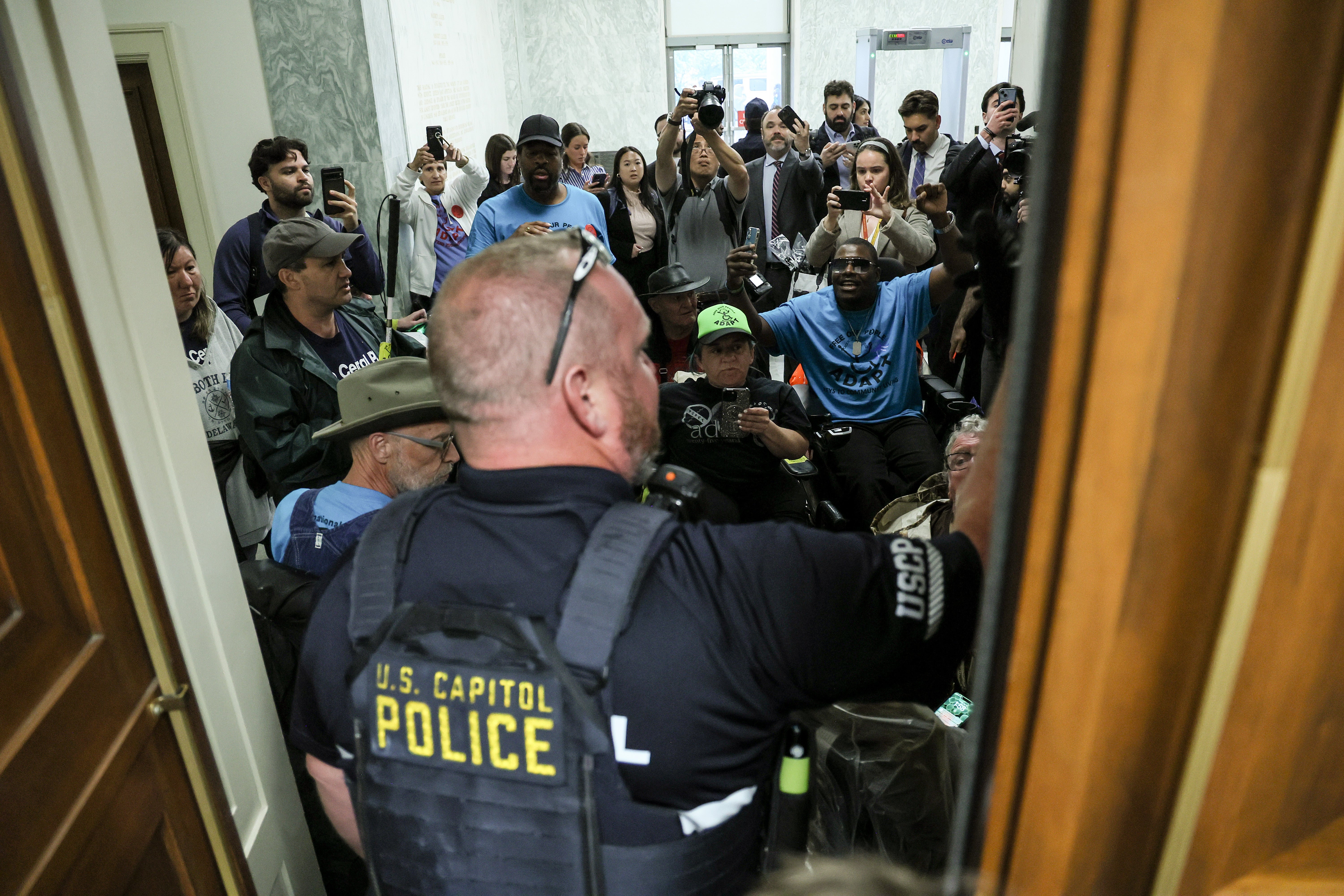 Proposed restrictions on Medicaid access have inspired protests from disability advocates