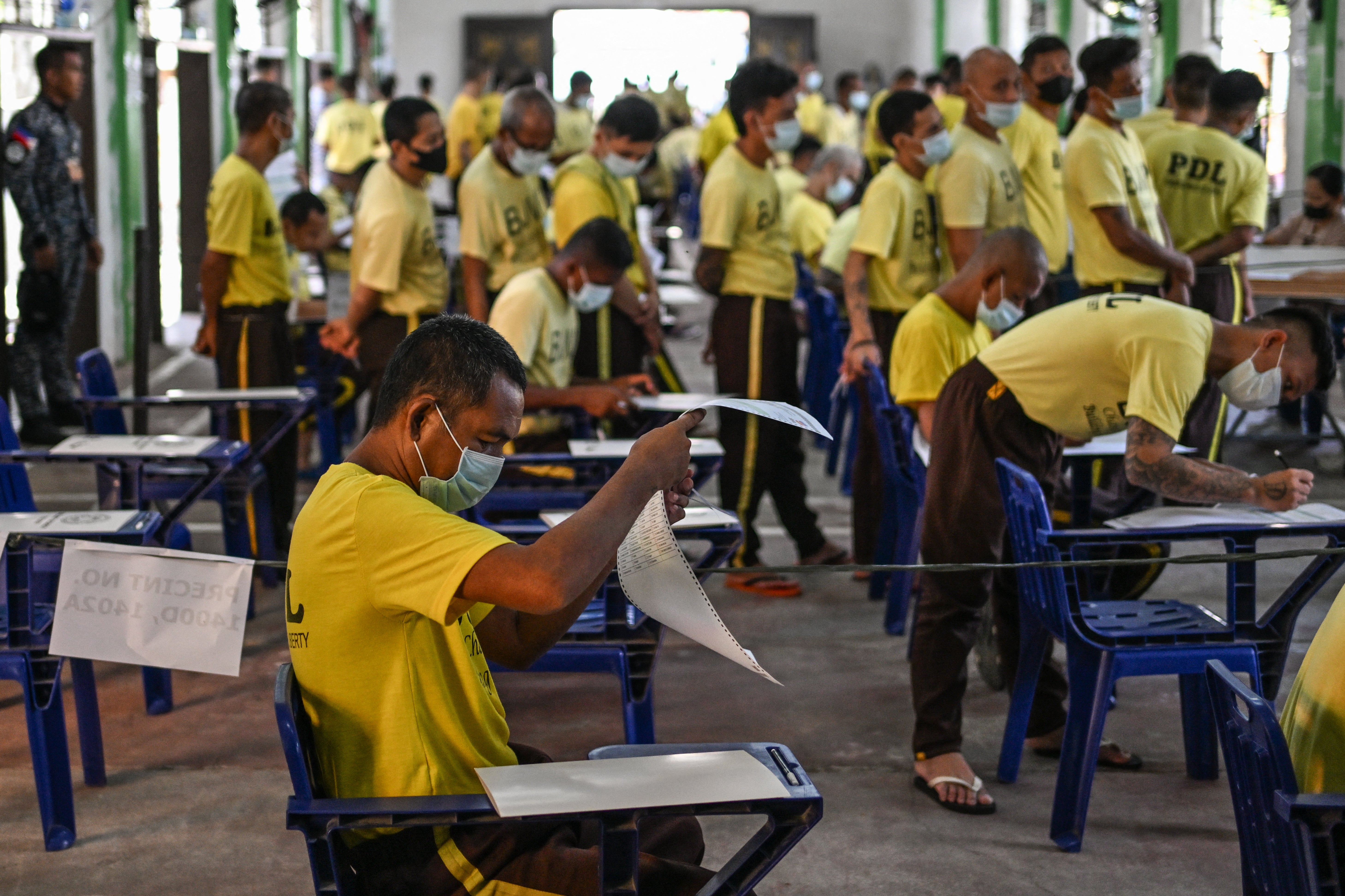 Detainees held at the Manila City Jail vote during the mid-term election