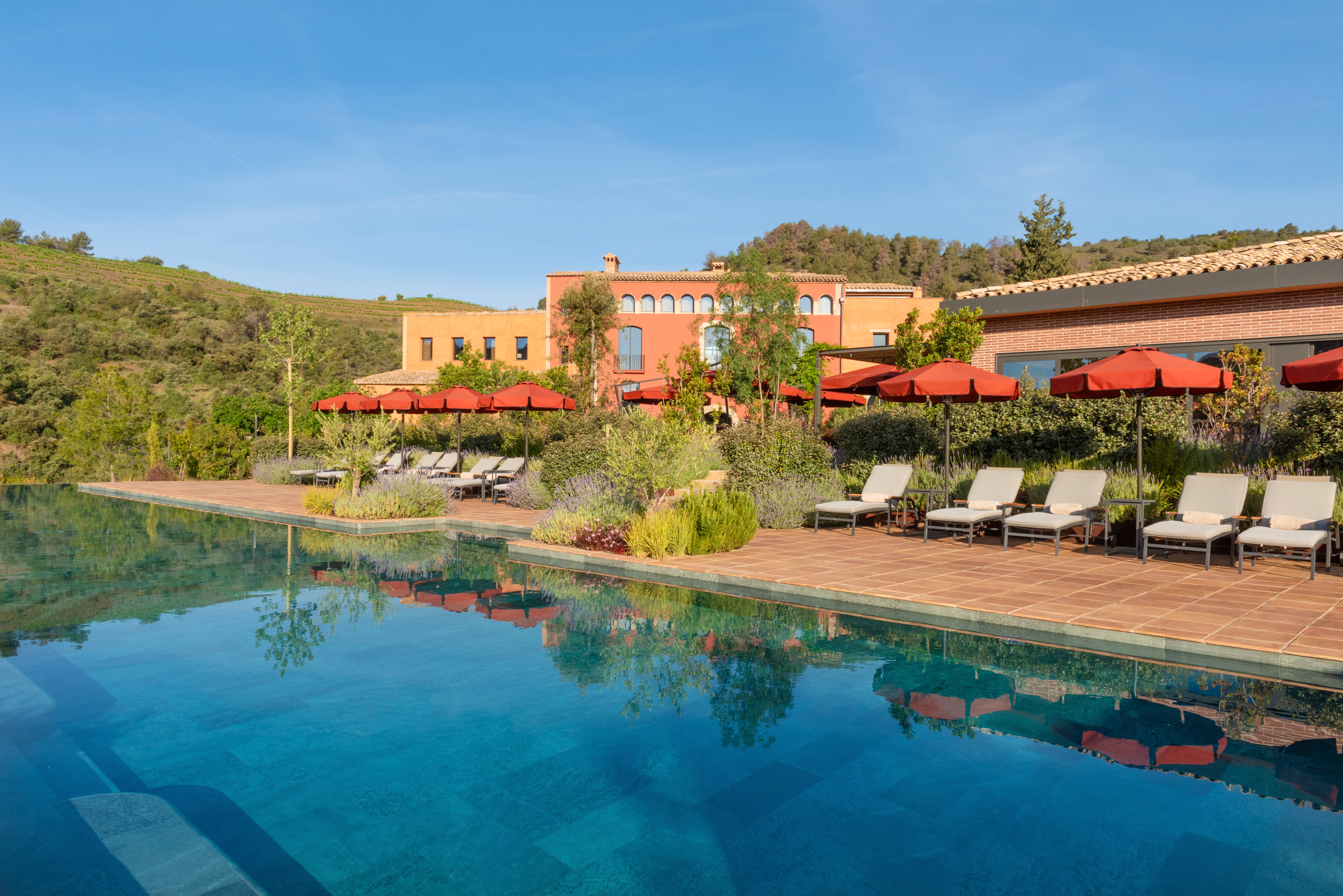 Pool and facade of the Gran Hotel Mas d’en Bruno in Spain
