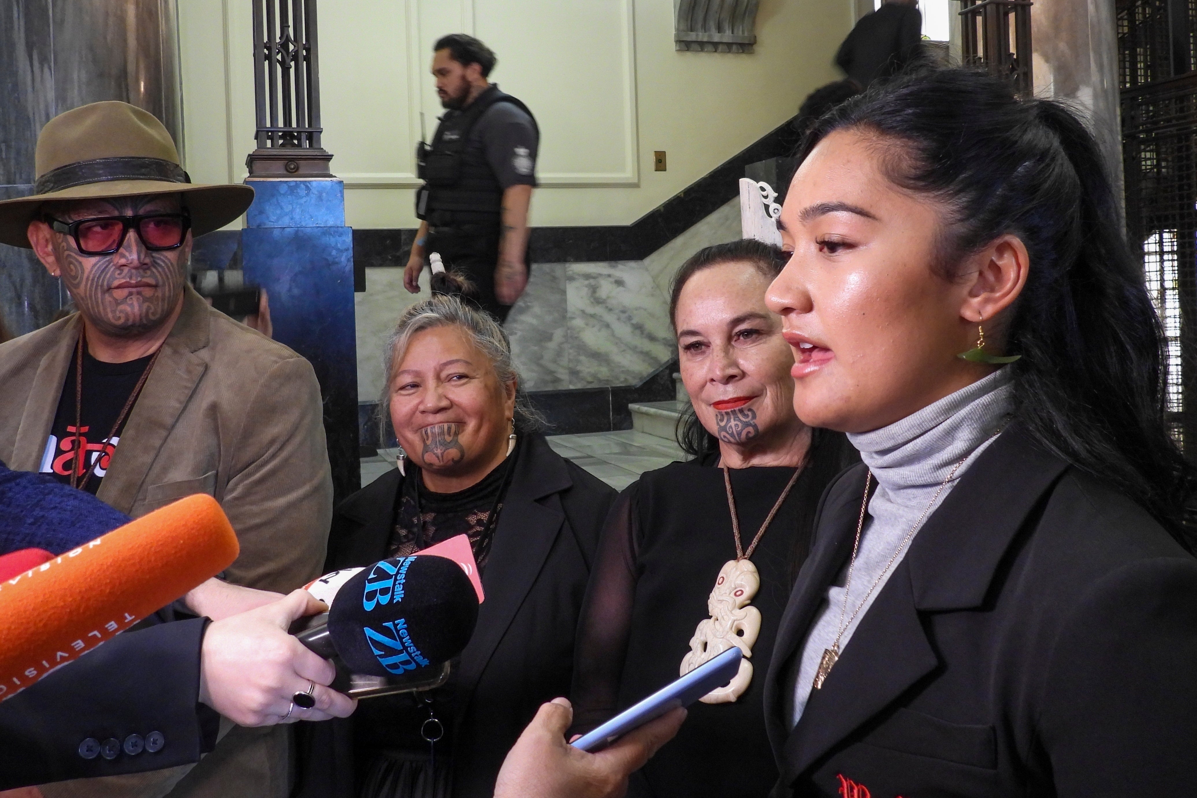 Hana-Rāwhiti Maipi-Clarke, right, speaks to the media alongside her Maori Party colleagues