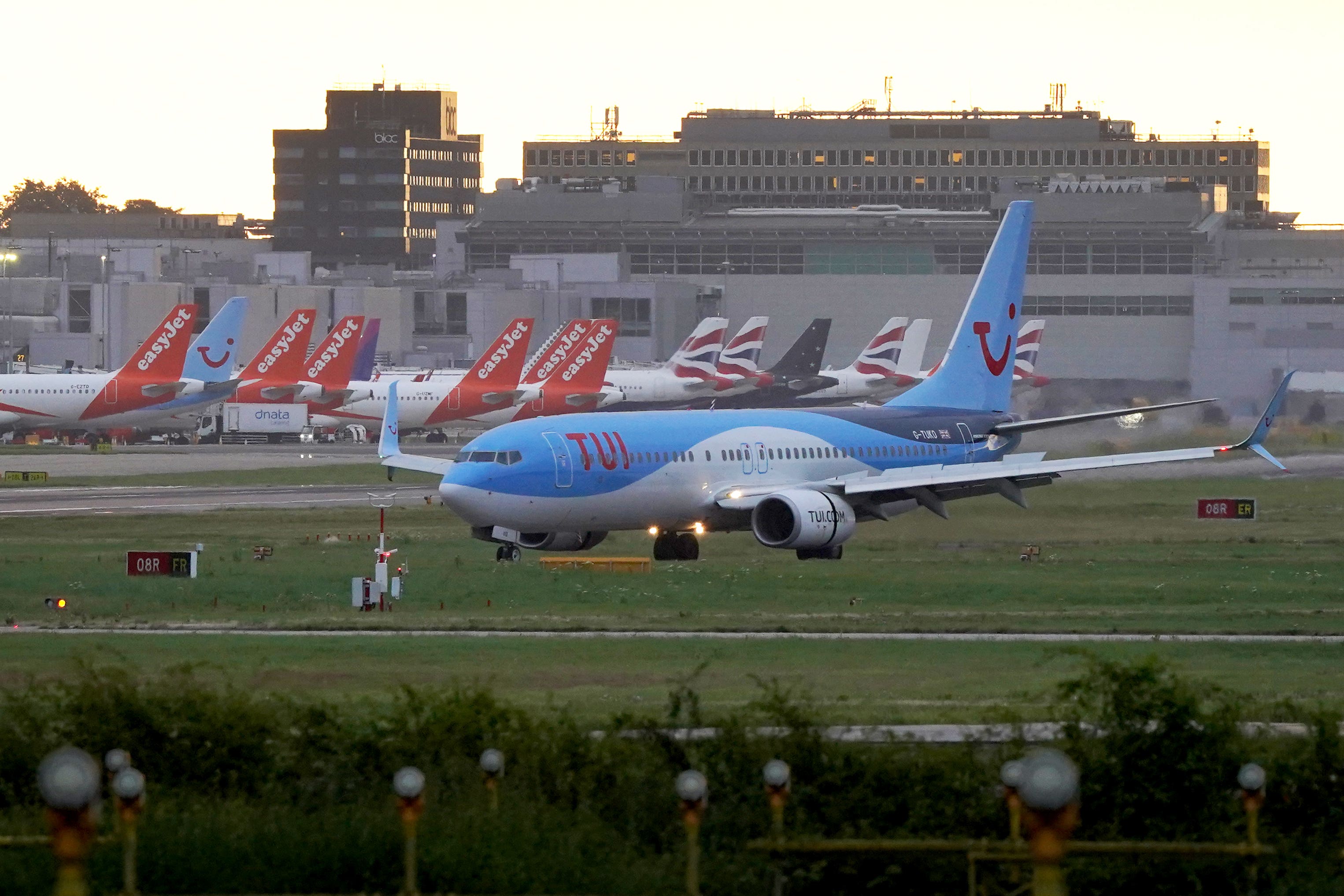 A TUI plane arrives at London Gatwick airport (Gareth Fuller/PA)