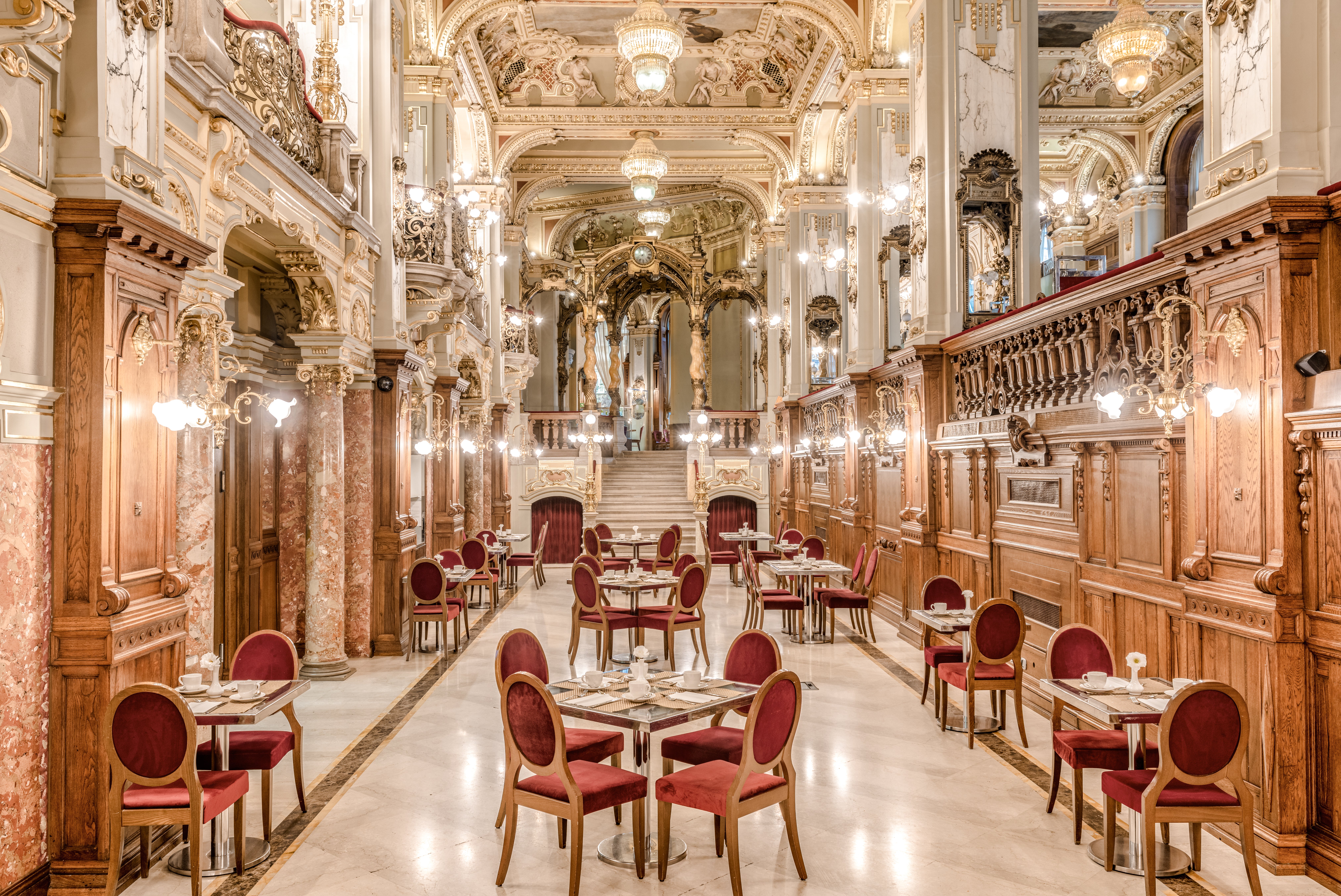 With frescoed ceilings, book a table at the hotel’s grand New York Cafe