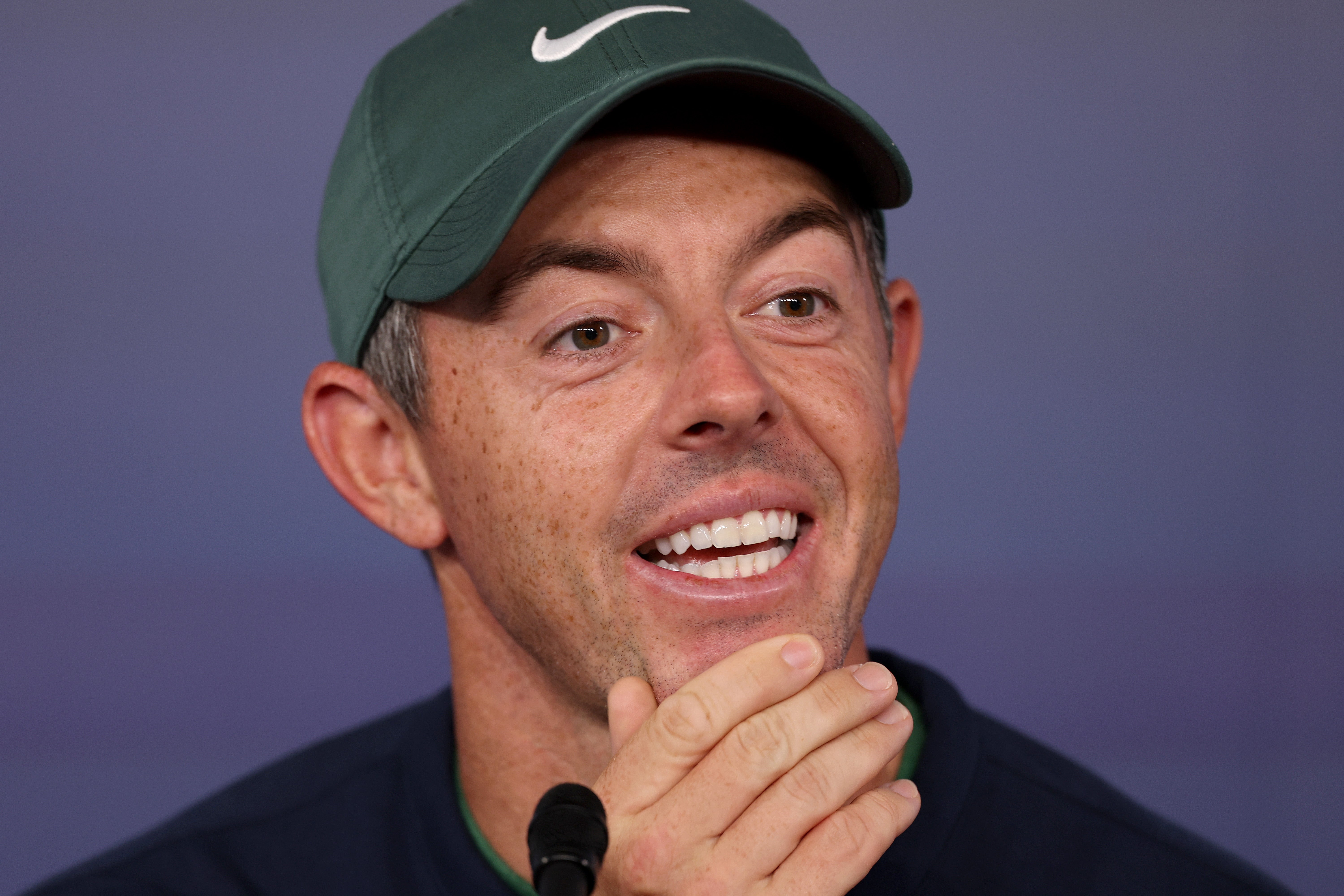 Rory McIlroy of Northern Ireland talks with reporters during a press conference before the PGA Championship at Quail Hollow