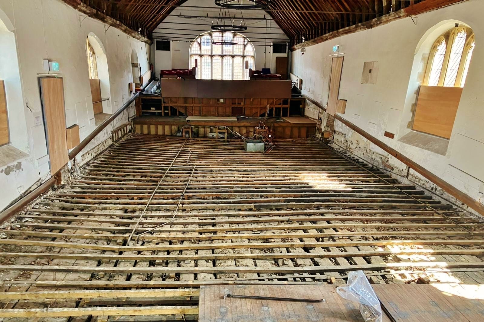 An area of historic timber floor larger than the size of a tennis court has been exposed at St George’s Guildhall in King’s Lynn, Norfolk as part of a heritage project (St George’s Guildhall/ PA)