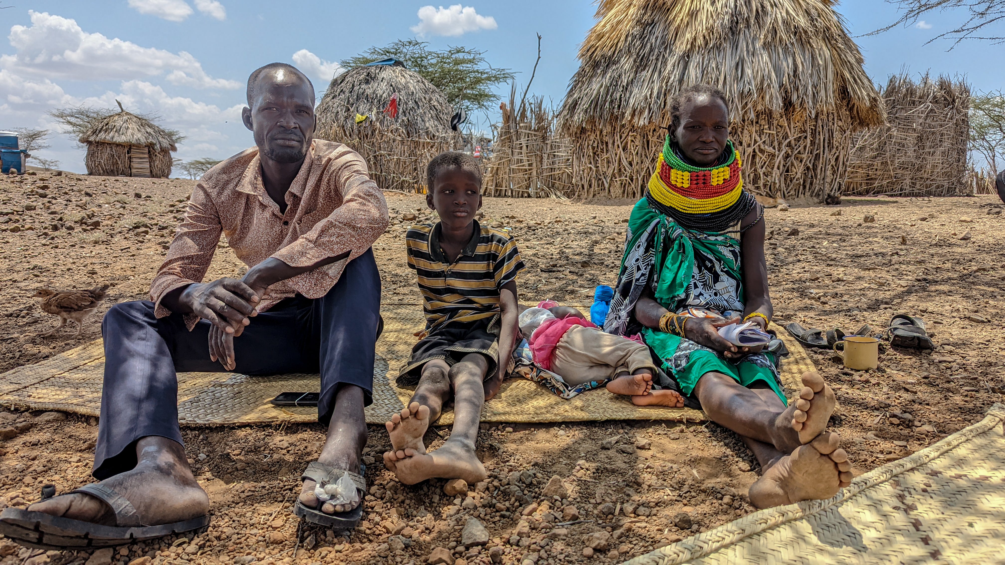 Parents Lomanat and Daniel with their daughter Ereng, 18 months, and son Mzee, 8
