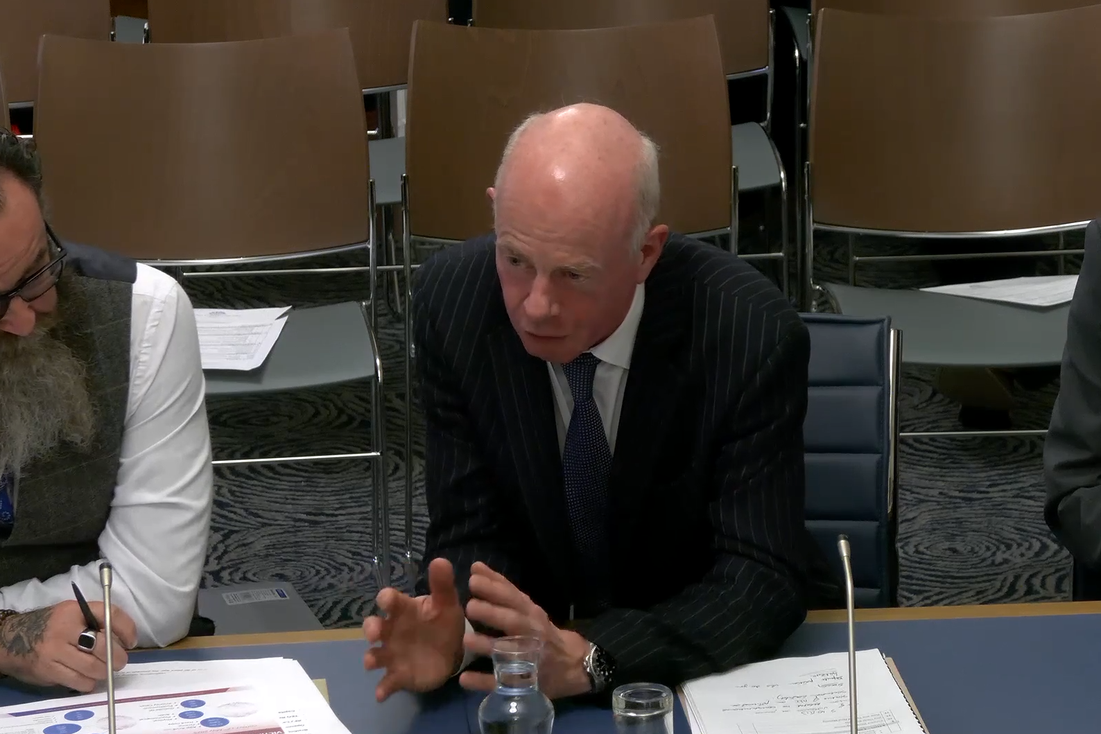 Mr Justice McAlinden, president of the Victims’ Payments Board, gives evidence to the Stormont Executive Committee on Wednesday afternoon (NI Assembly/PA)