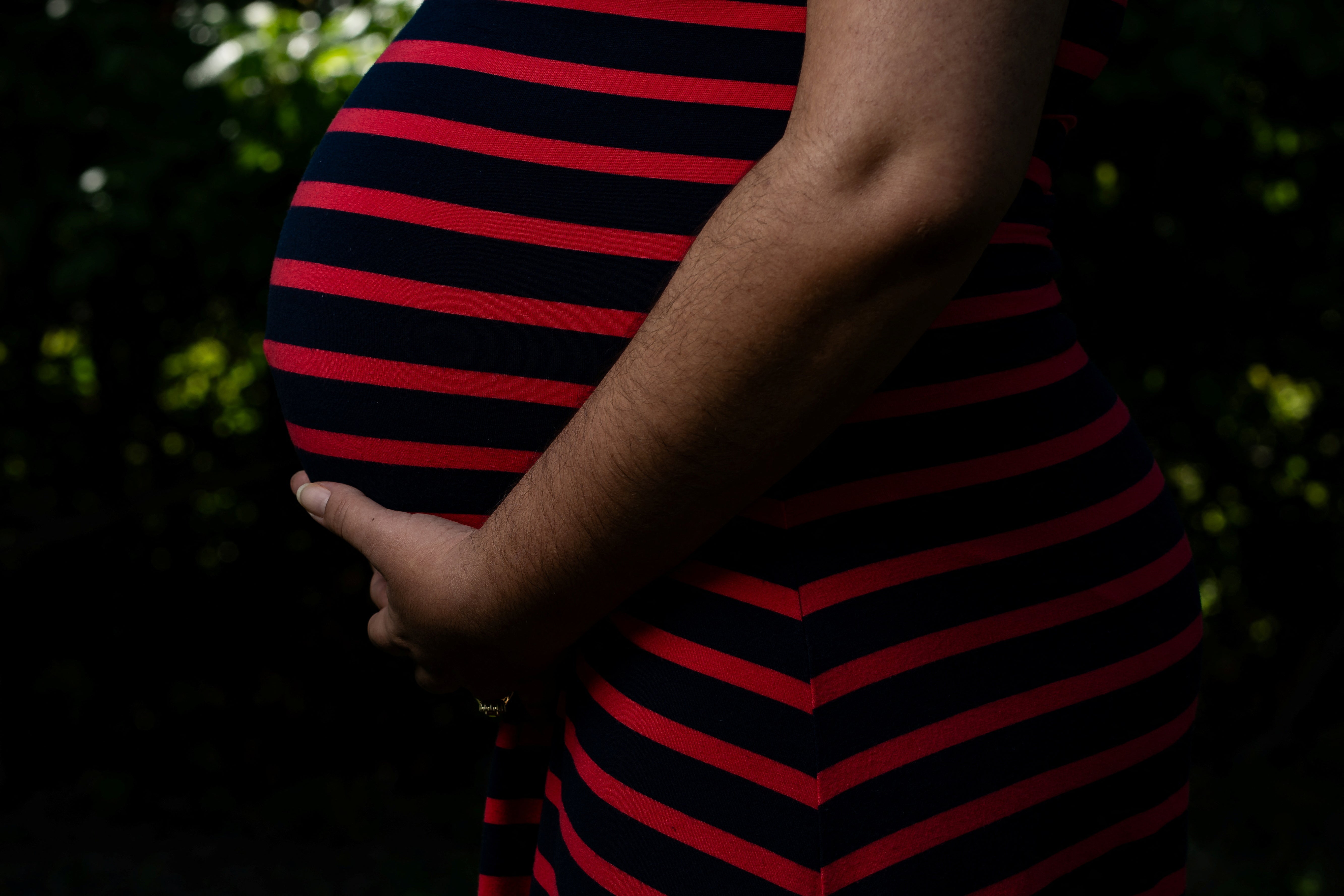 Barbara, a 35-year old pregnant asylum seeker from Cuba, poses for a portrait in Louisville, Kentucky on May 9