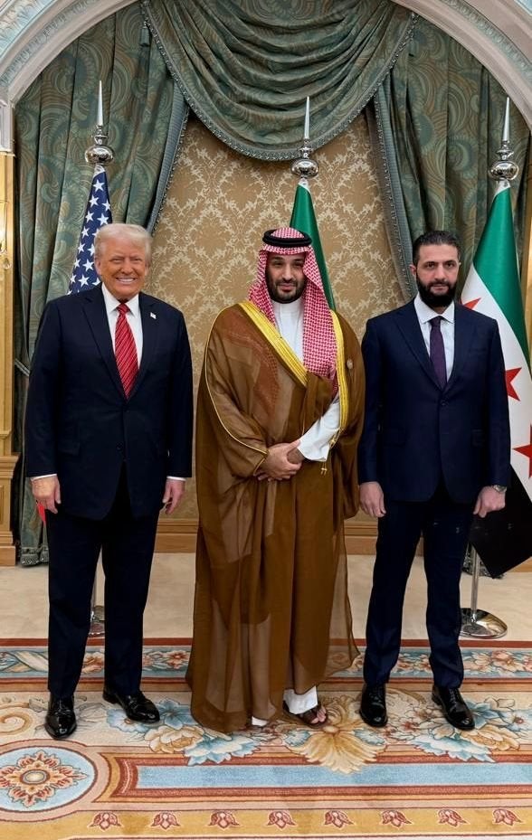 Trump met the Syrian president (R) in Saudi Arabia after lifting sanctions during Middle East visit