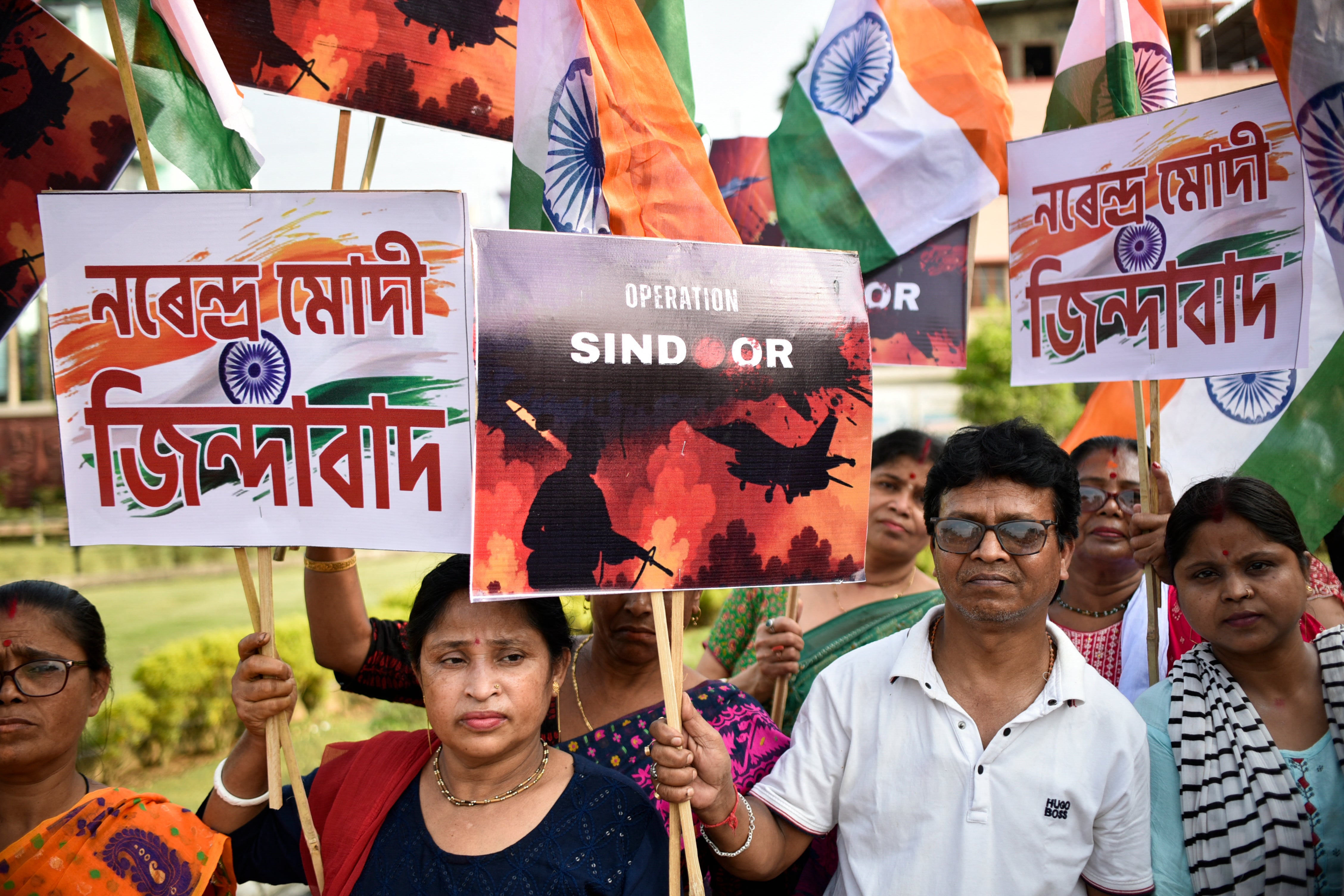 People holding Indian national flags take part in a rally, expressing solidarity with the armed forces in Guwahati, India on 14 May 2025, following a ceasefire between Pakistan and India. Pakistan returned a captured border guard to India on 14 May, in a fresh sign of detente after a ceasefire ended four days of conflict between the nuclear-armed rivals