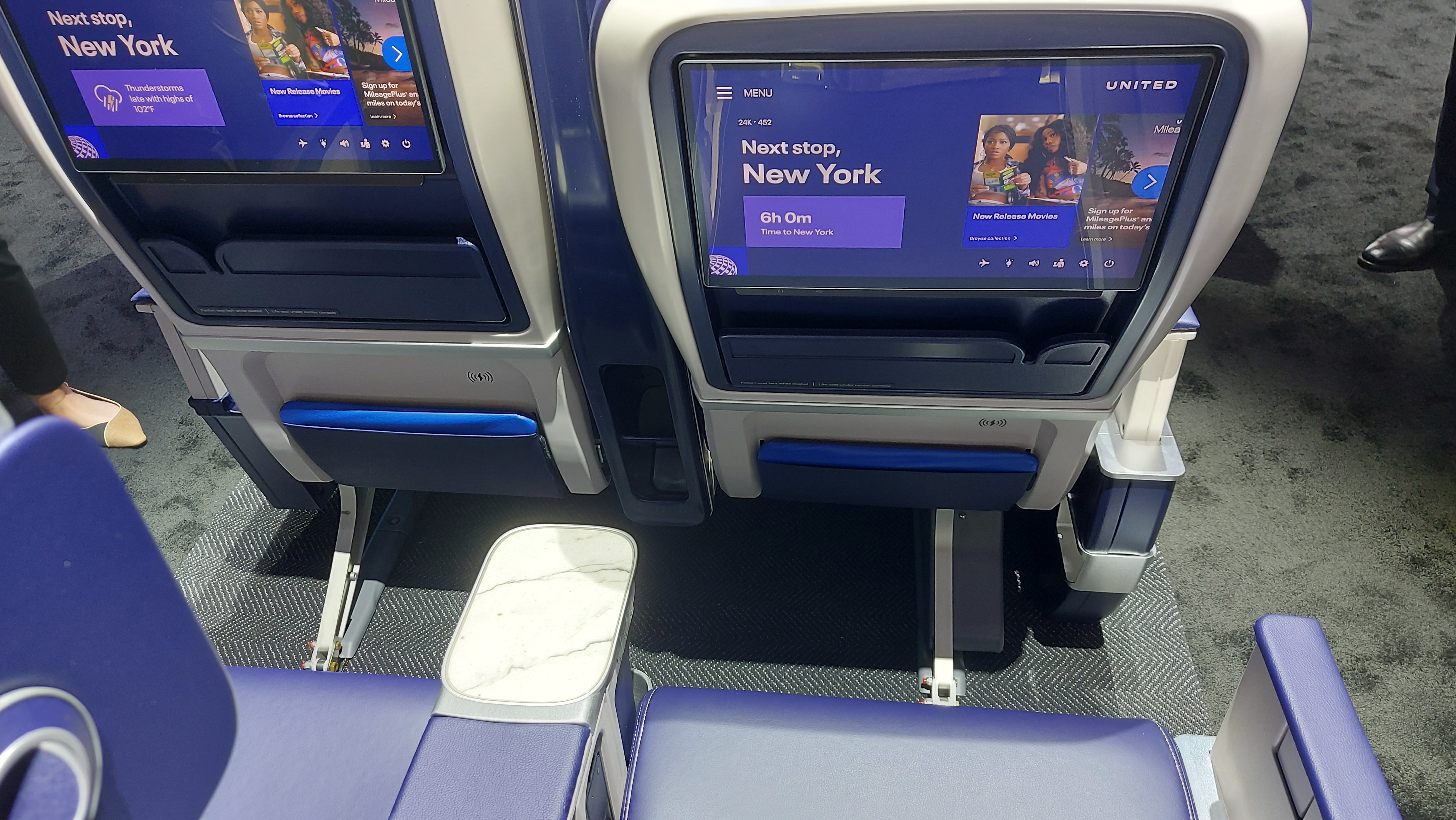 The new premium economy seats feature wireless charging pads