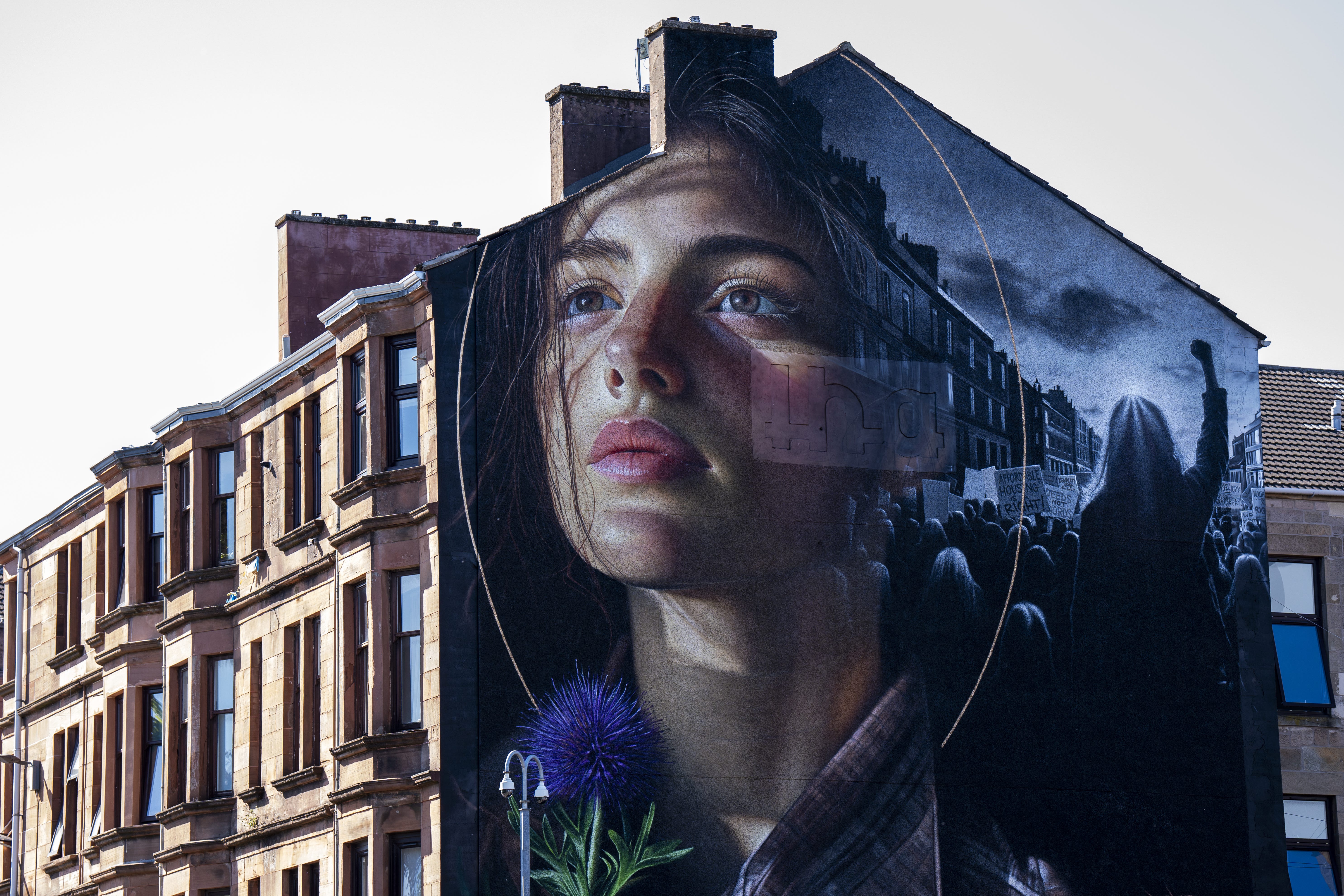 A new mural reimagining the iconic Govan activist Mary Barbour as a modern-day campaigner has been unveiled on the gable end of 1198 Govan Road, Glasgow (Jane Barlow/PA)