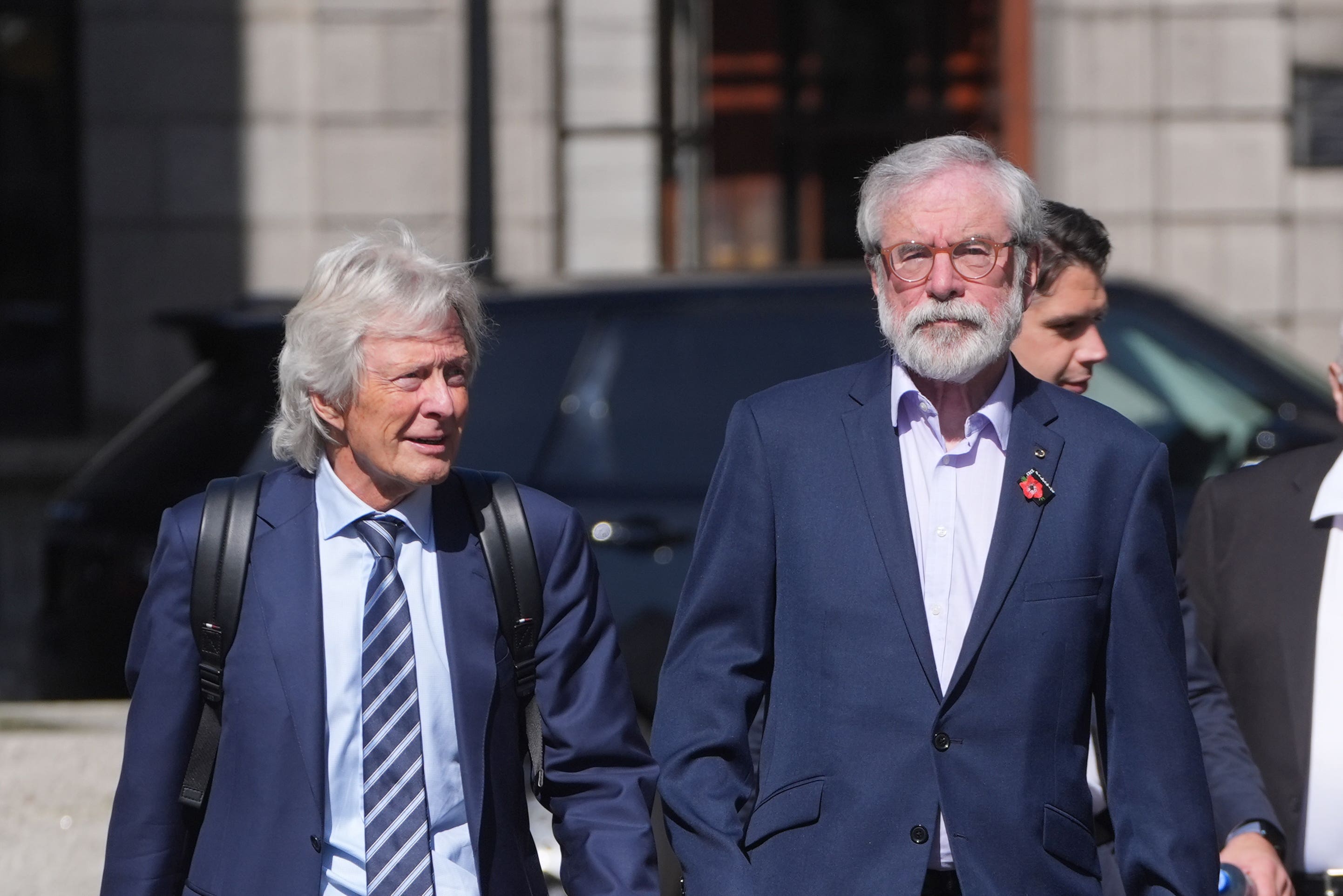 Former Sinn Fein president Gerry Adams (right) and solicitor Paul Tweed (left) arrive at the High Court in Dublin, where Adams is bringing a legal action against the BBC over allegations about the murder of an MI5 spy (Brian Lawless/PA)