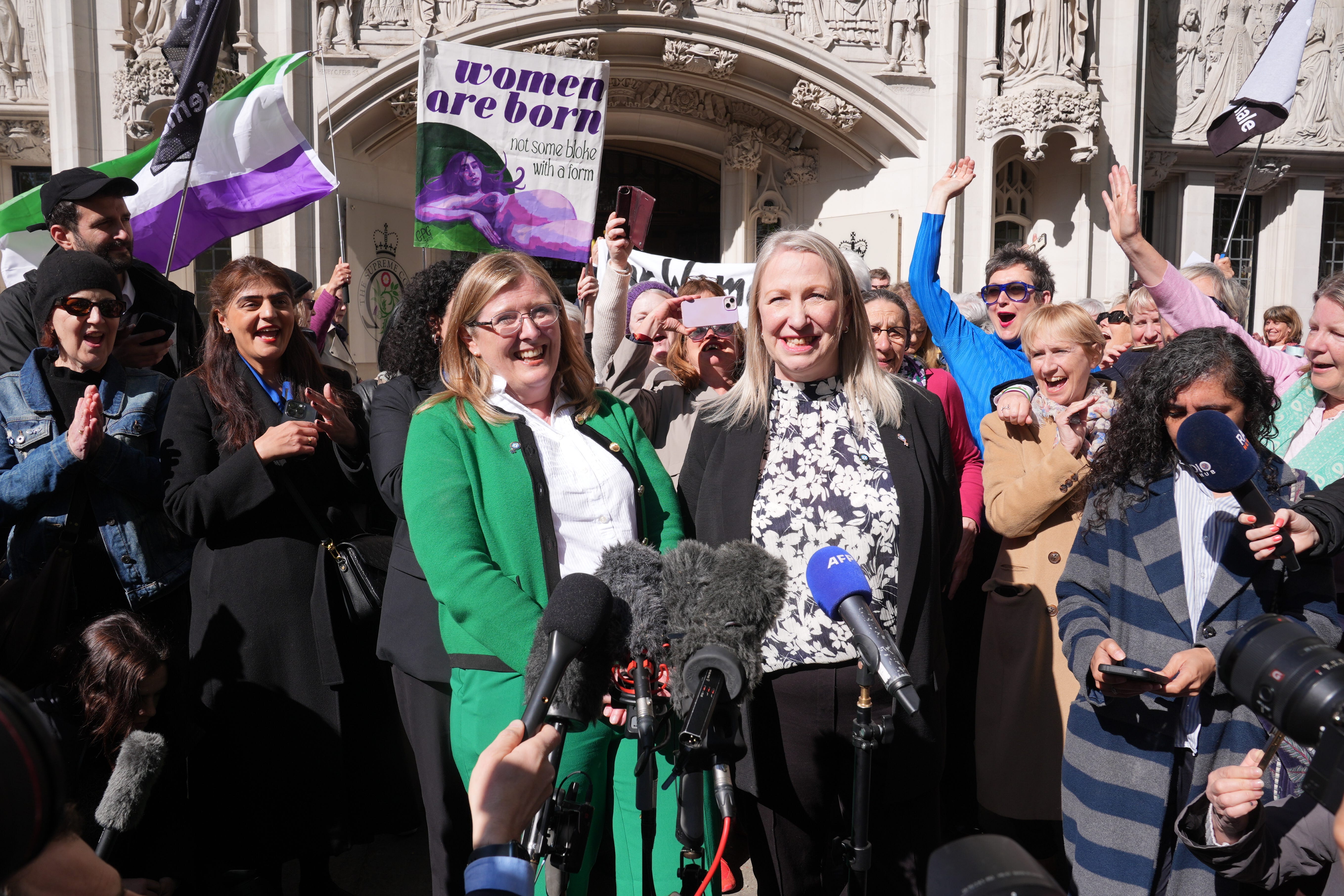 For Women Scotland campaigners celebrated the ruling outside the Supreme Court in London last month (PA)
