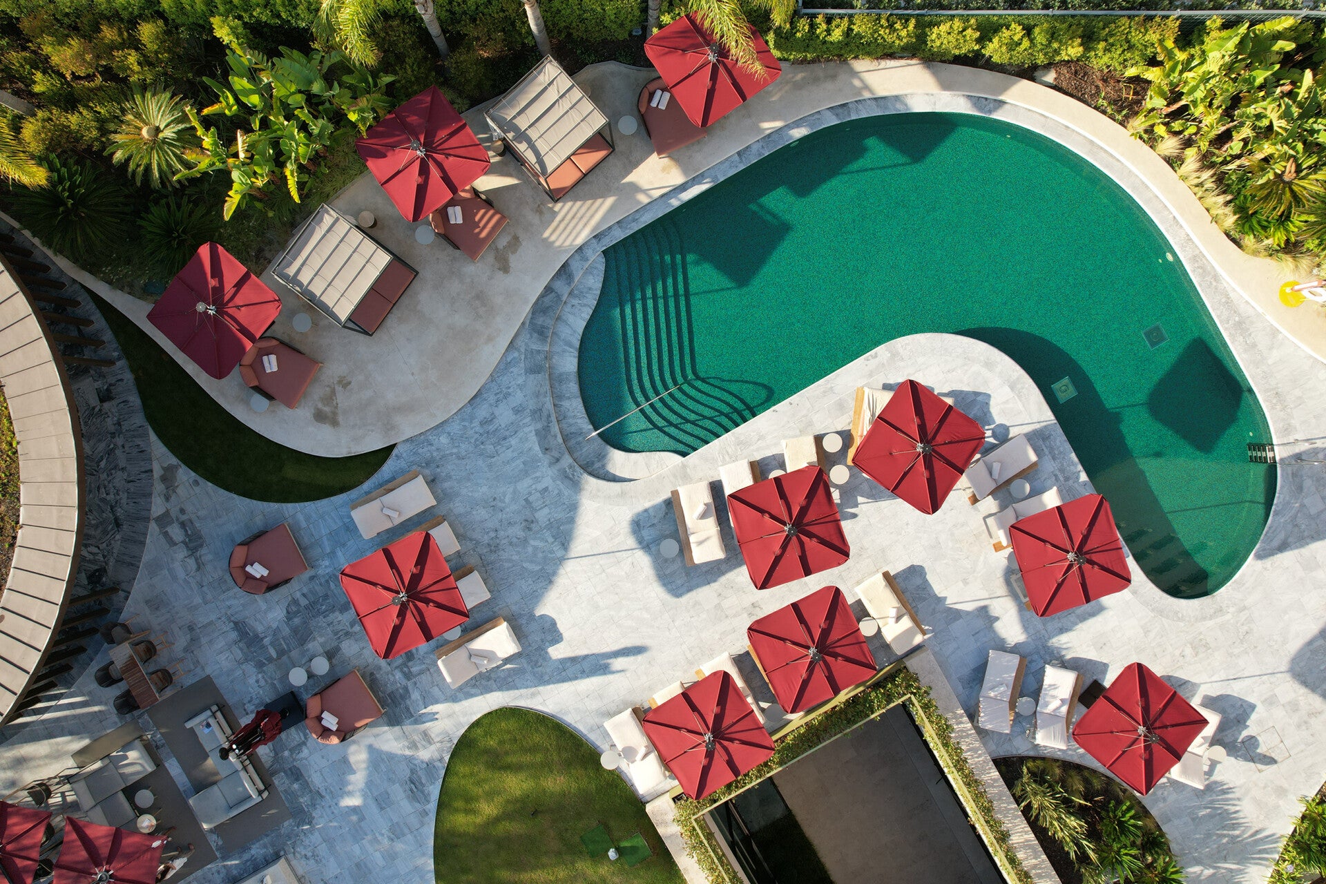 <p>Lounge around the outdoor pool at the Four Seasons Hotel Ritz Lisbon </p>