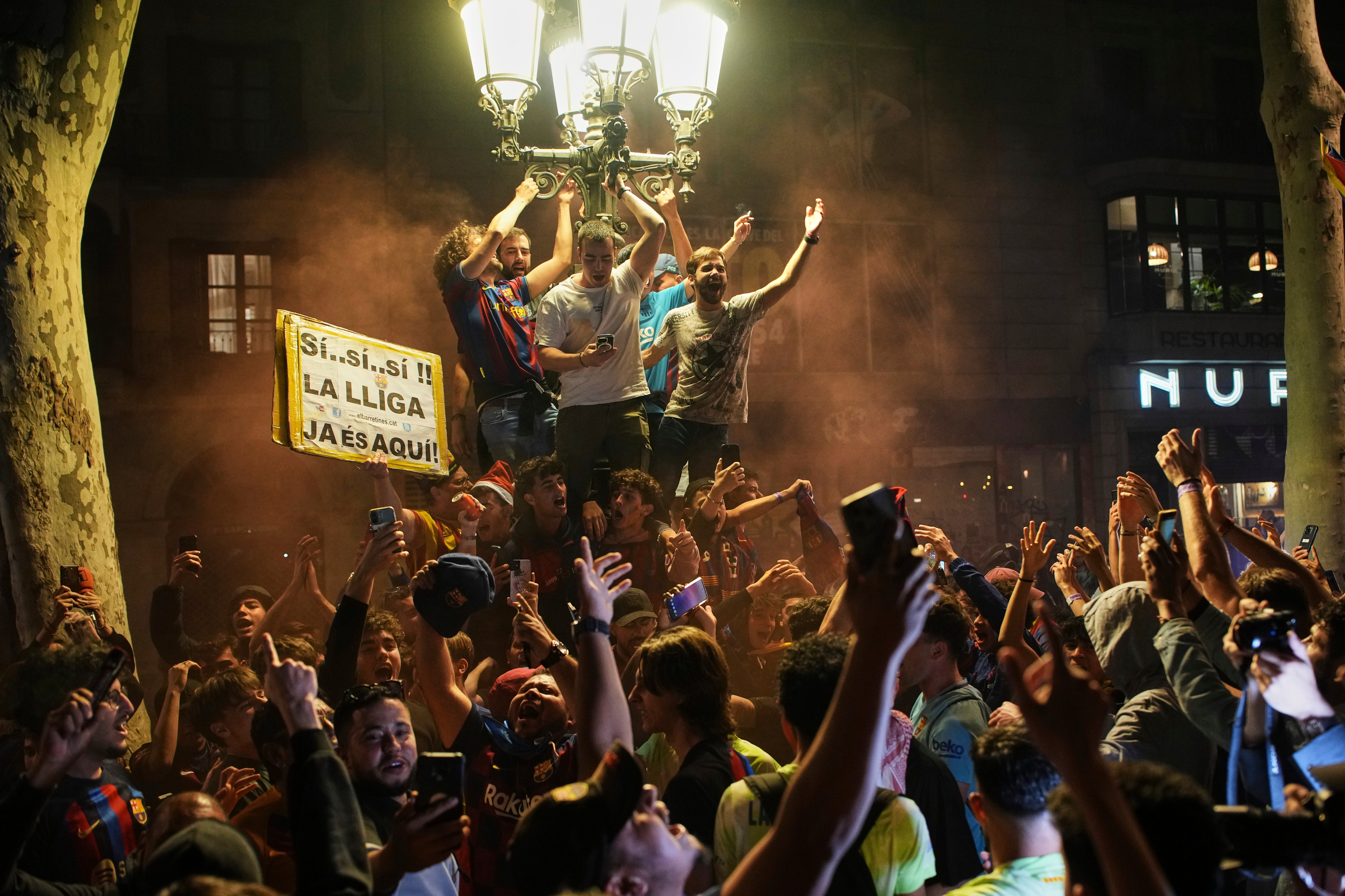 Fans celebrate in the streets of Barcelona