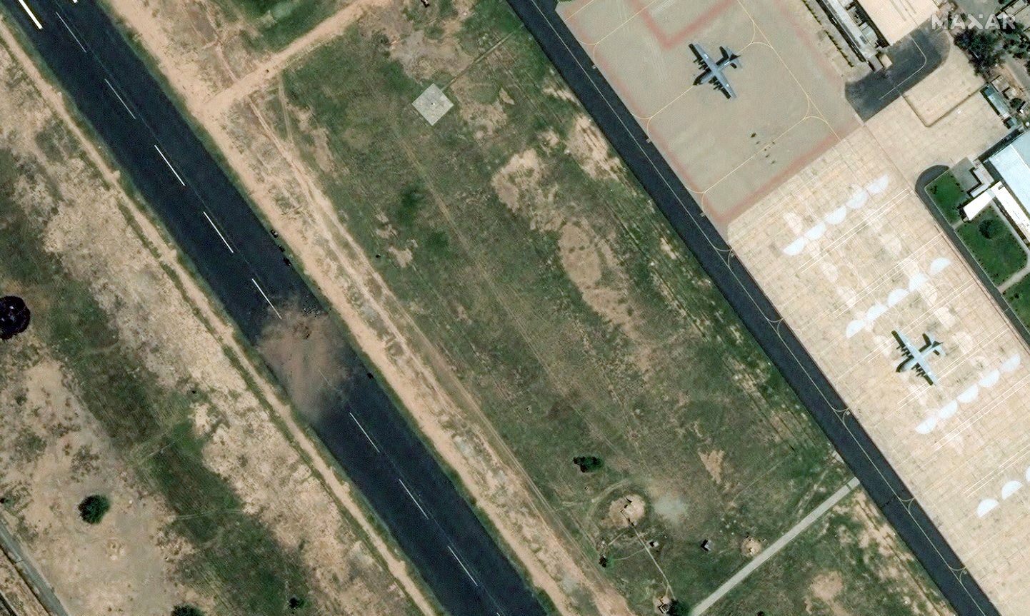 This satellite image provided by Maxar Technologies shows the runway after it was damaged by a strike during hostilities with India at PAF Base Mushaf in Sargo dha, Pakistan