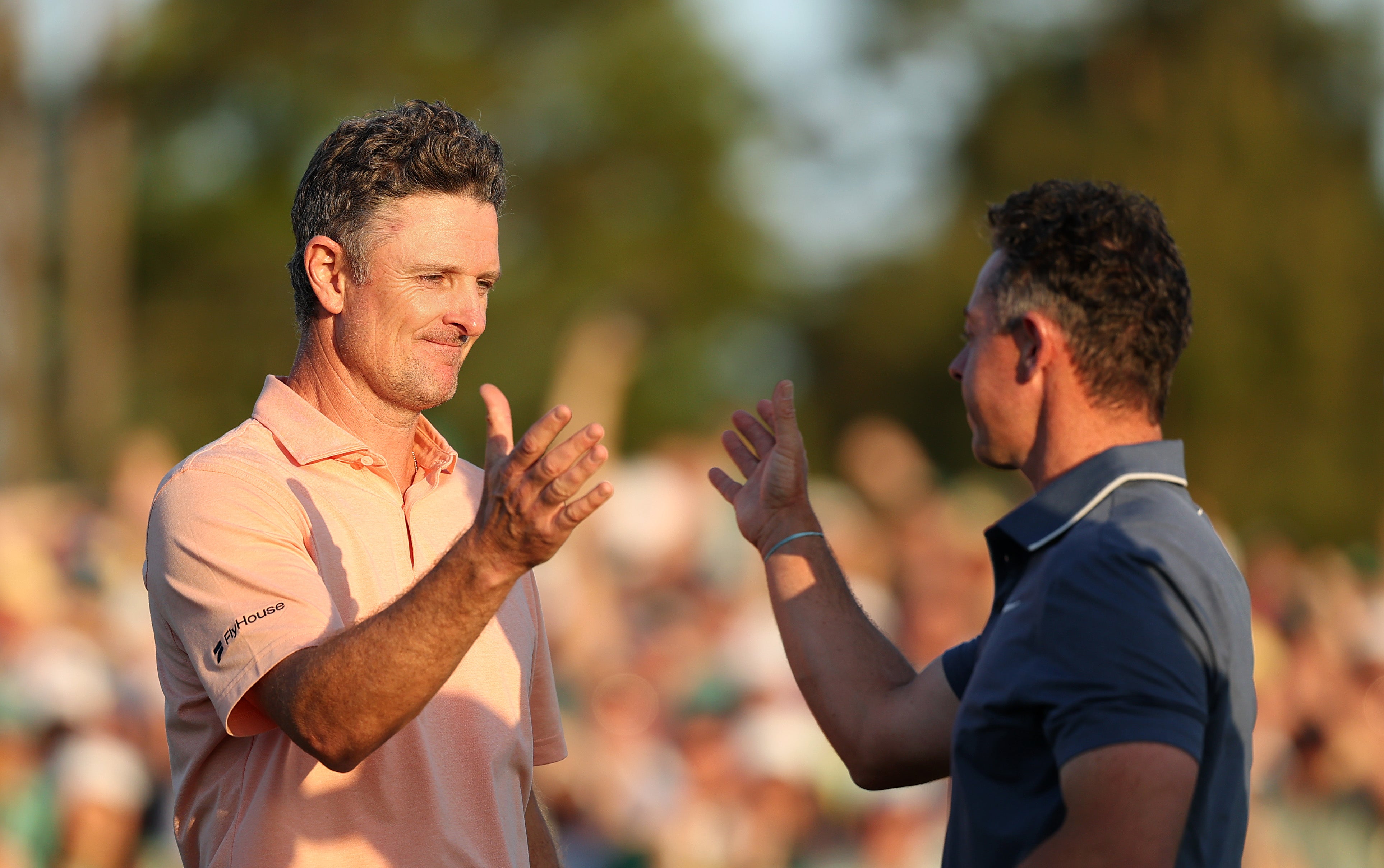 Justin Rose (left) was left baffled by the praise he received after congratulating Rory McIlroy for winning the Masters in April