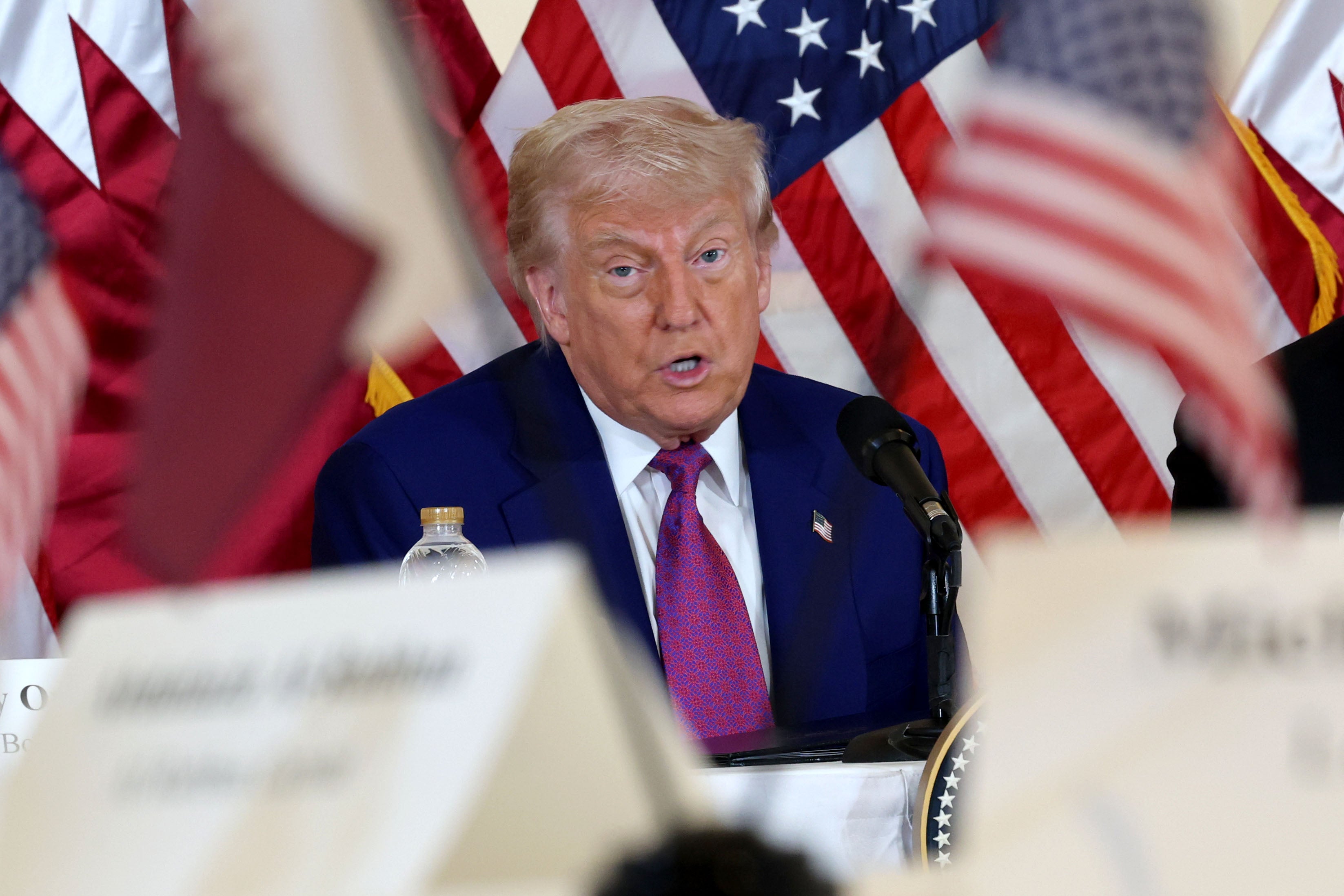 Trump speaking during the meeting with business leaders in Doha