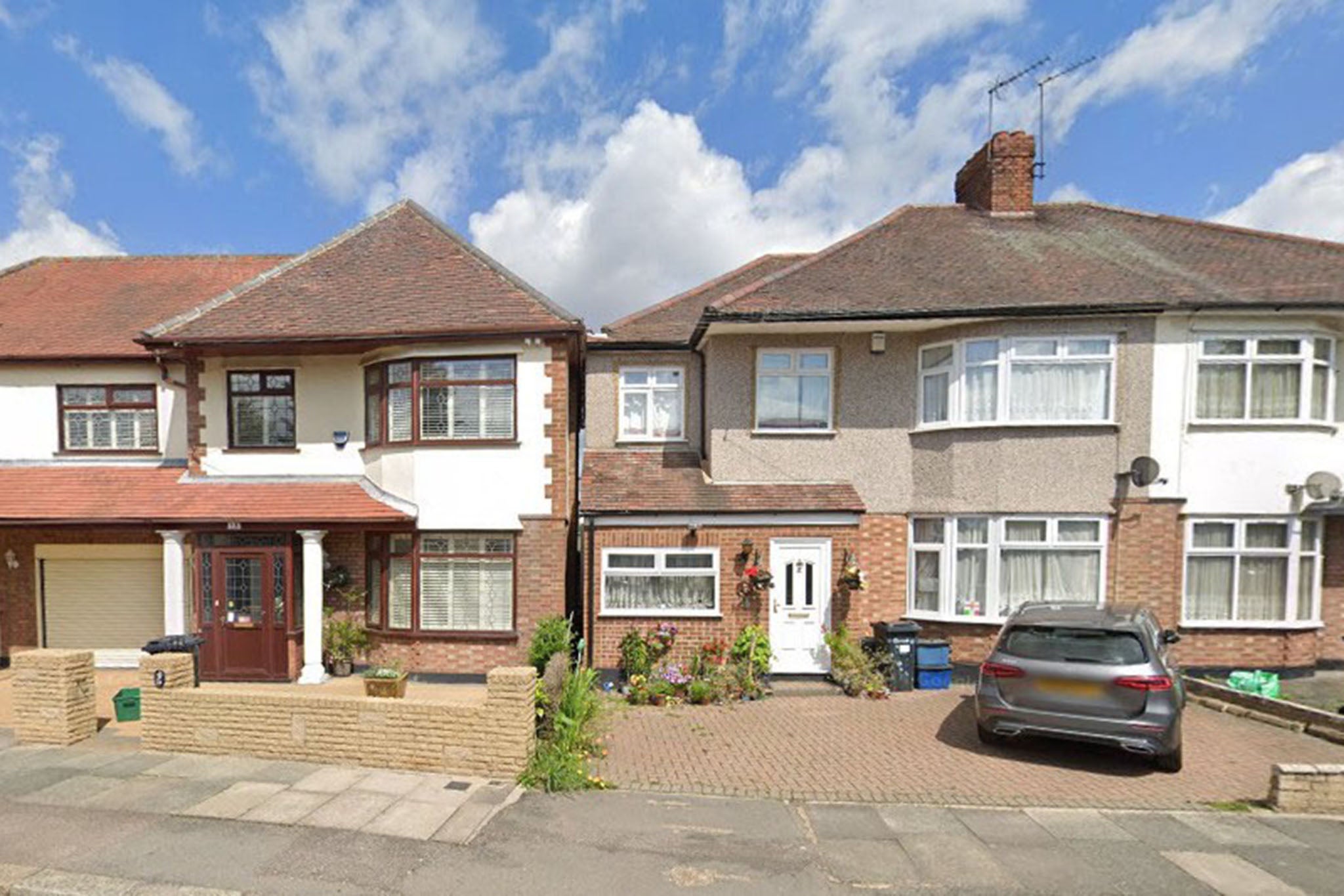 The gap between the two houses is not even wide enough for a person to comfortably walk down