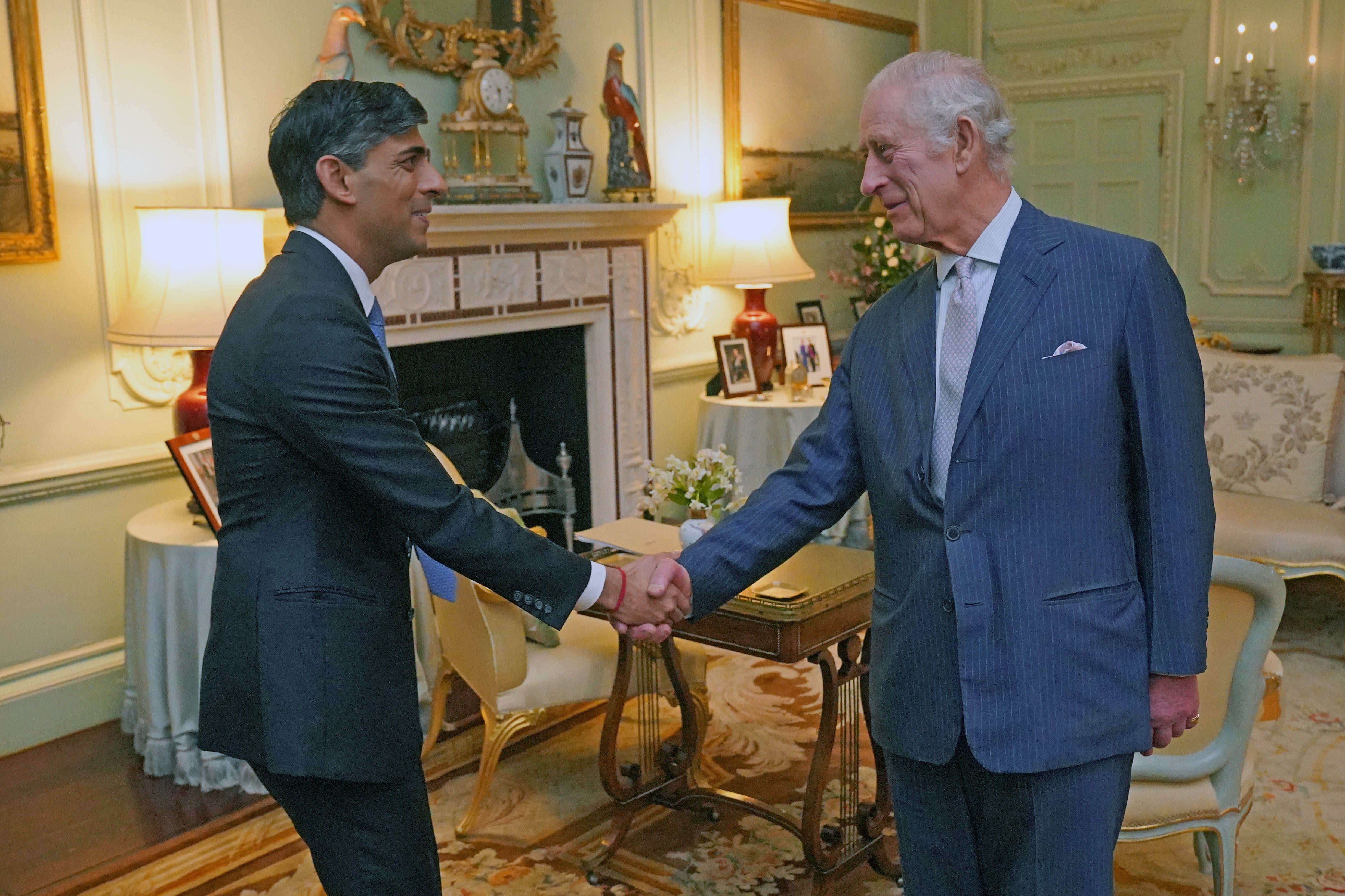 The King with then-prime minister Rishi Sunak at Buckingham Palace in 2024 (Jonathan Brady/PA)