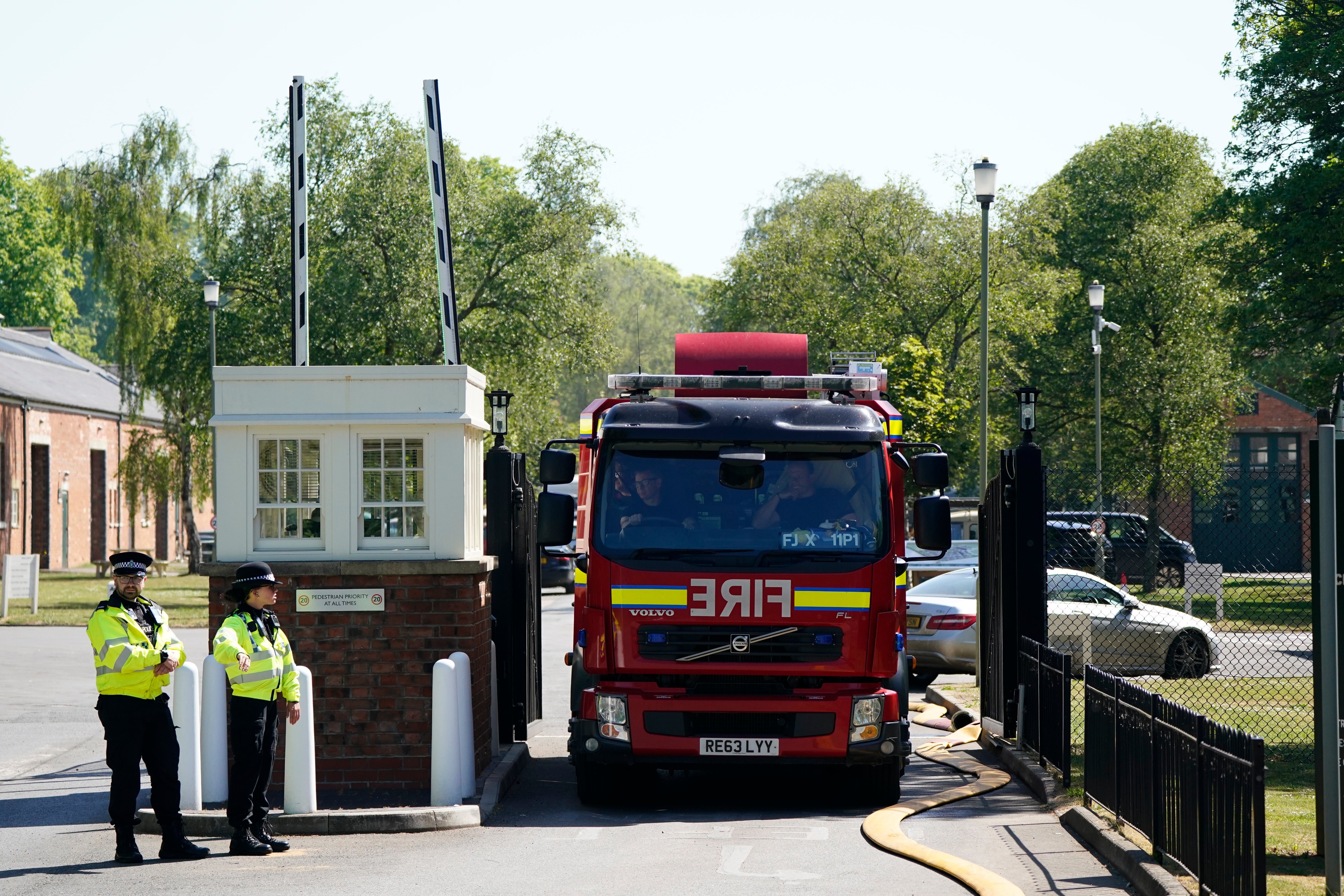 Firefighters leave the scene
