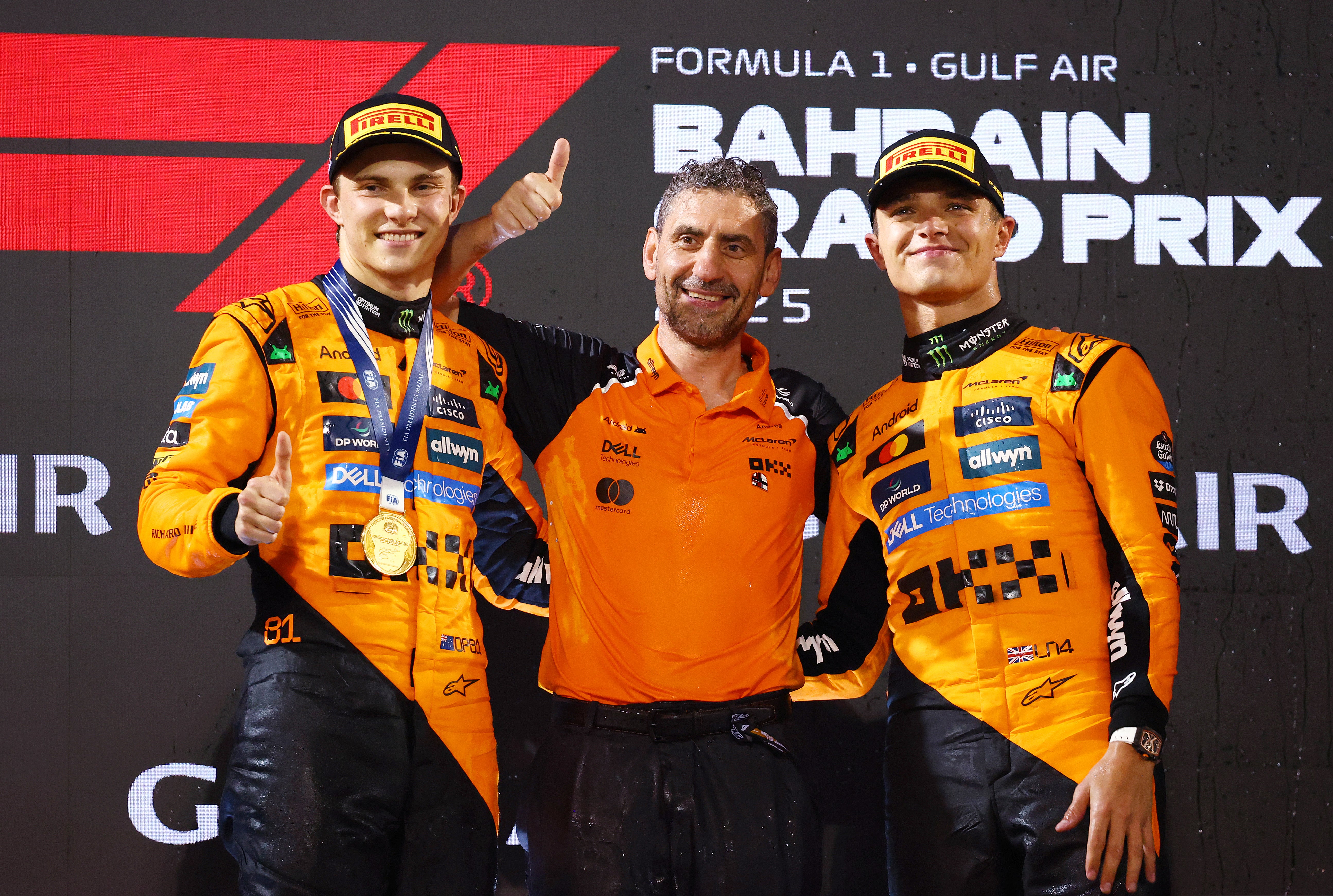 McLaren team principal Andrea Stella with both drivers