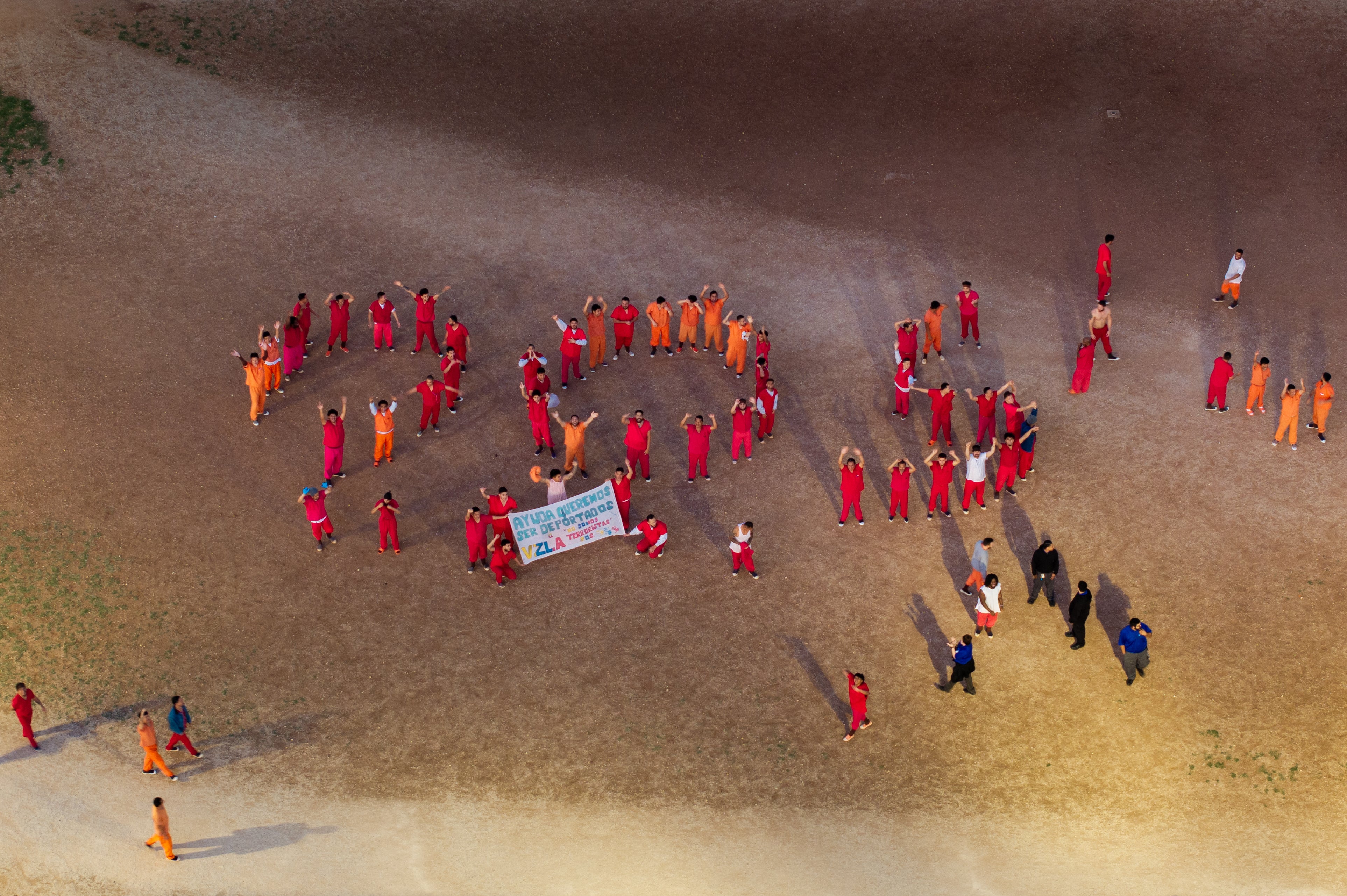 Immigrants at the Bluebonnet Detention Center in Texas form ‘SOS’