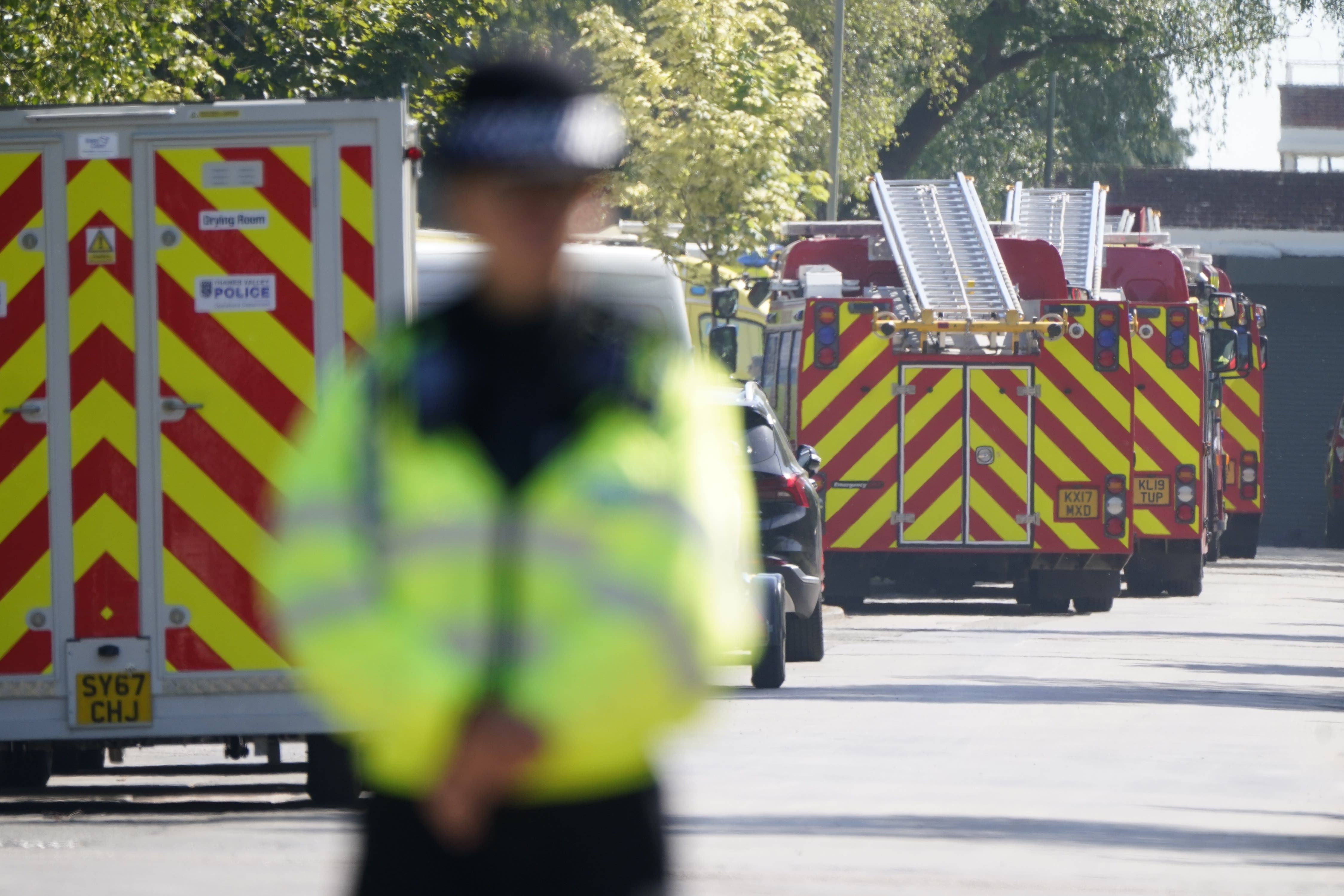 Emergency services near the scene of the fire at Bicester Motion (Andrew Matthews/PA)