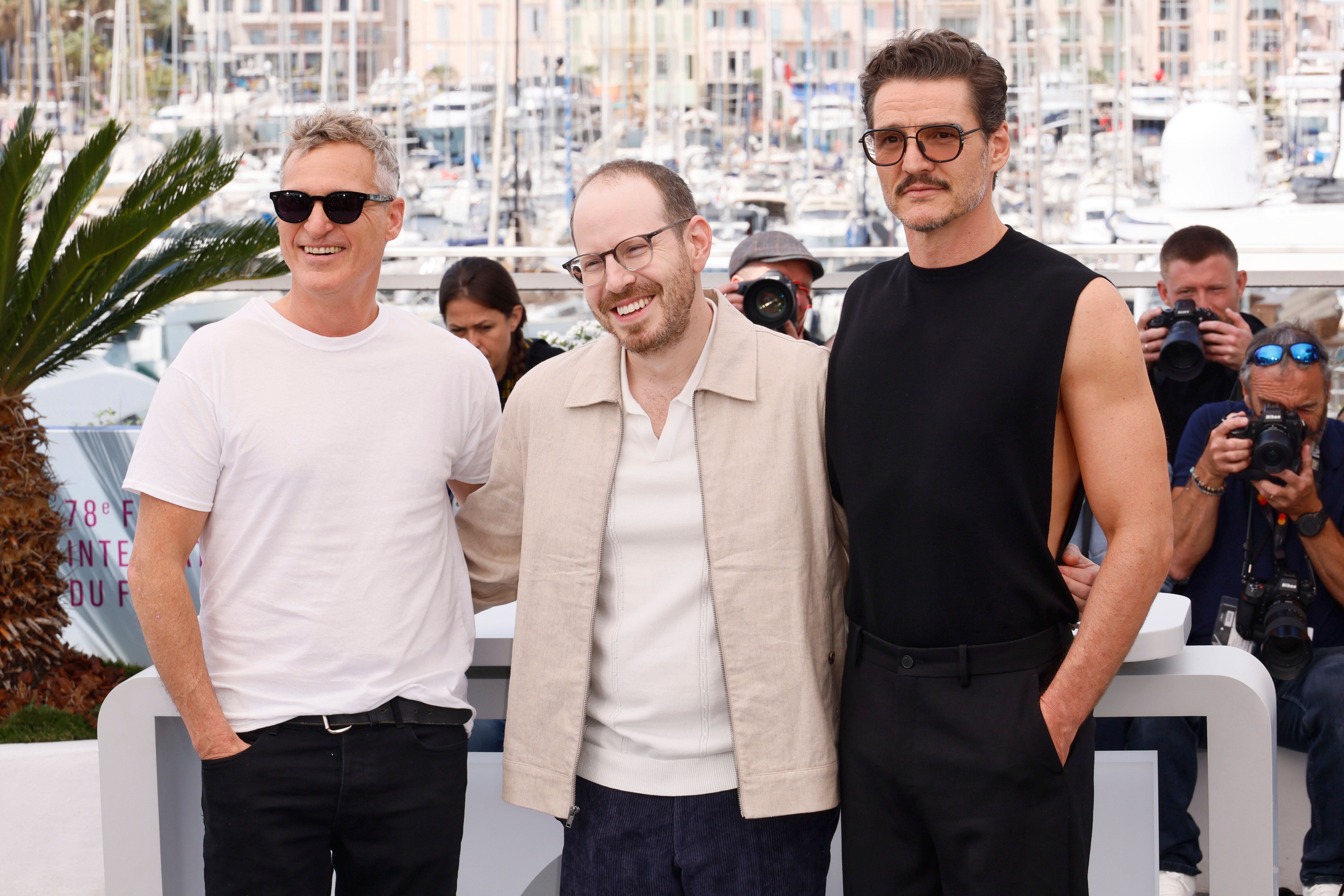 Joaquin Phoenix, from left, director Ari Aster and Pedro Pascal pose for photographers at the photo call for the film 'Eddington' at the 78th international film festival, Cannes, southern France, 17 May 2025
