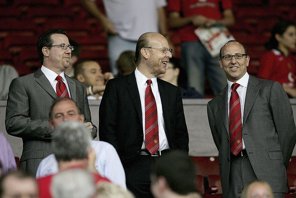 Joel Glazer, Avram Glazer and Bryan Glazer pictured at Old Trafford ahead of a Champions League third qualifying round on 9 August 2005