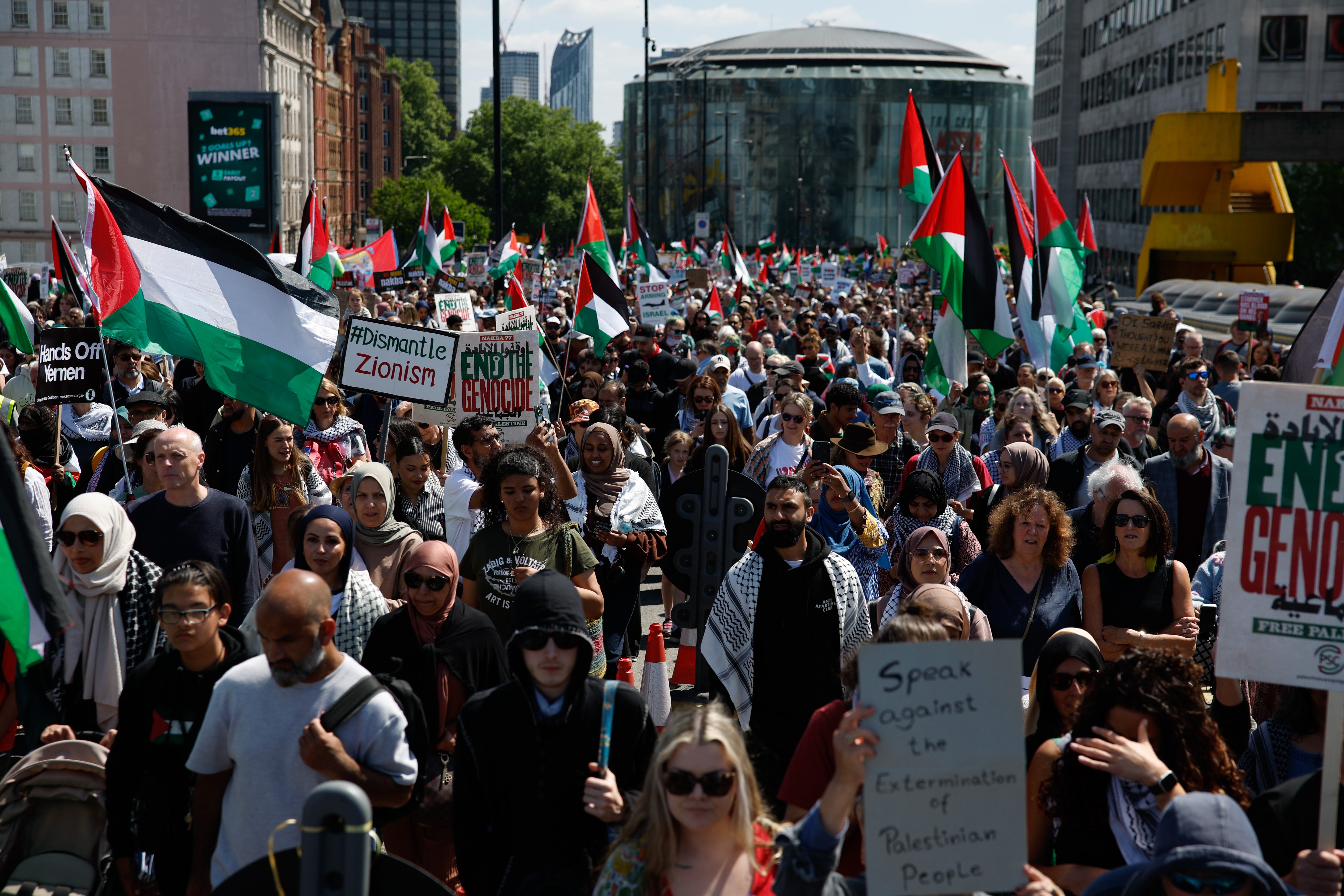 Demonstrators attend the protests to mark the Nakba anniversary