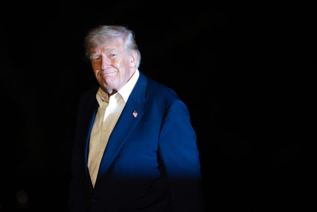 <p>US President Donald Trump smiles after arriving on Marine One on the South Lawn of the White House in Washington, DC, on May 16, 2025, following a trip to the Middle East</p>
