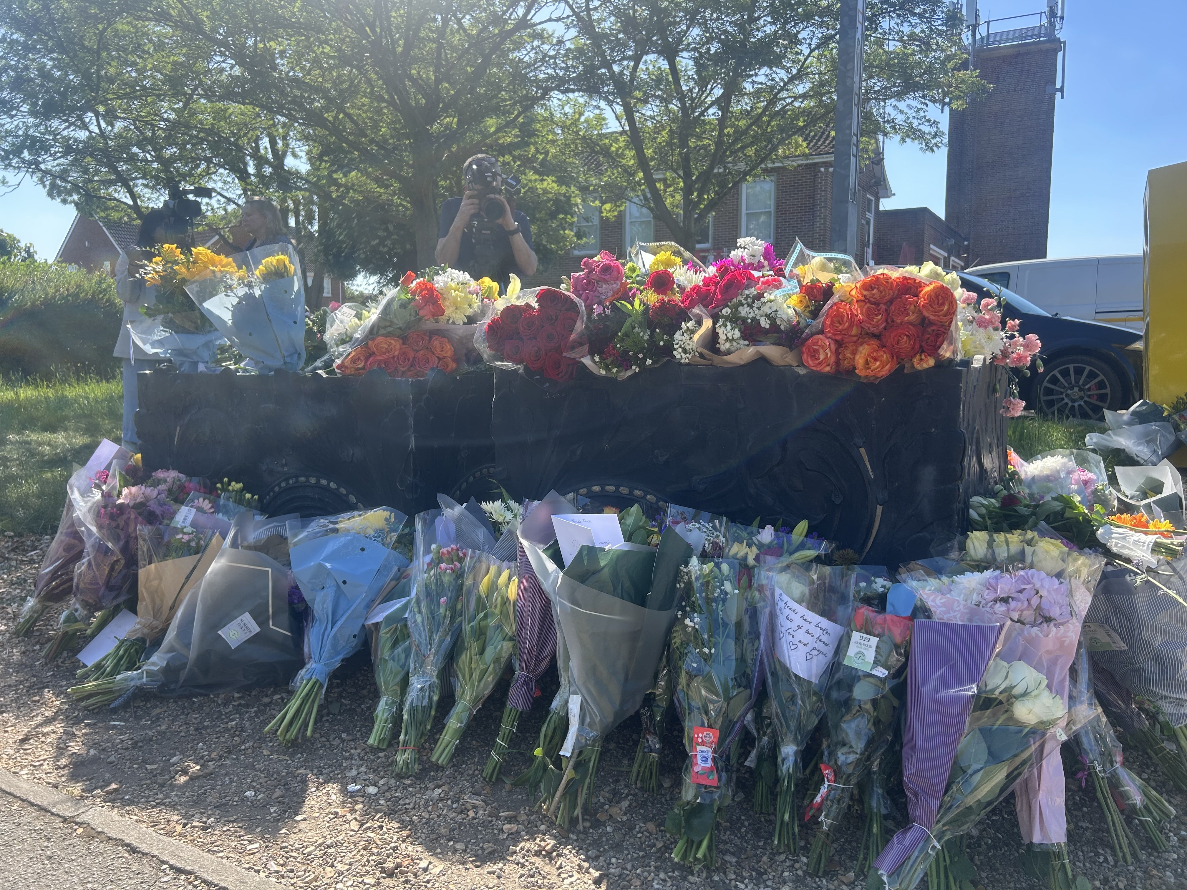 Flowers left outside Bicester Fire Station following the tragedy