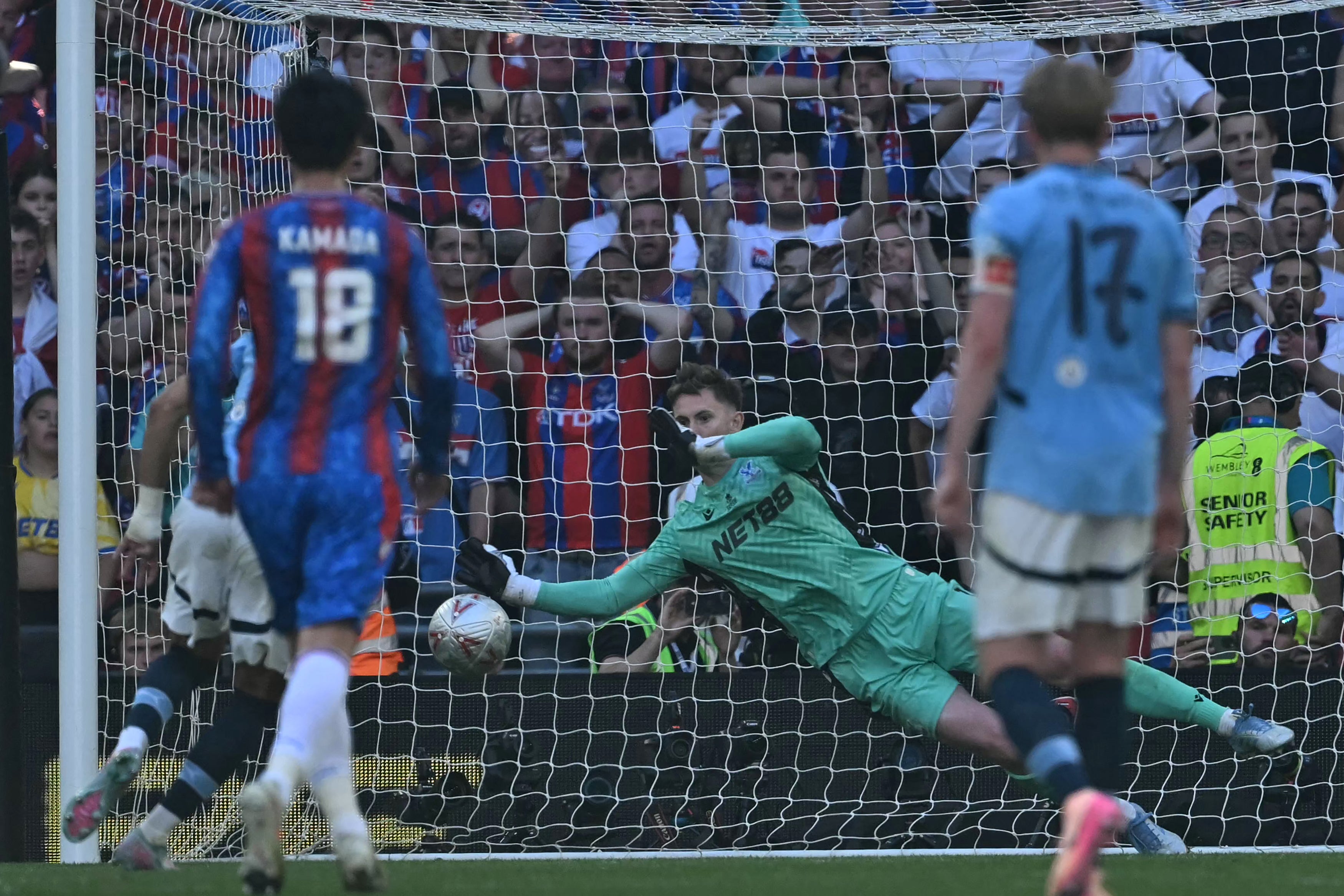 Crystal Palace's Dean Henderson saves a penalty taken by Manchester City's Omar Marmoush