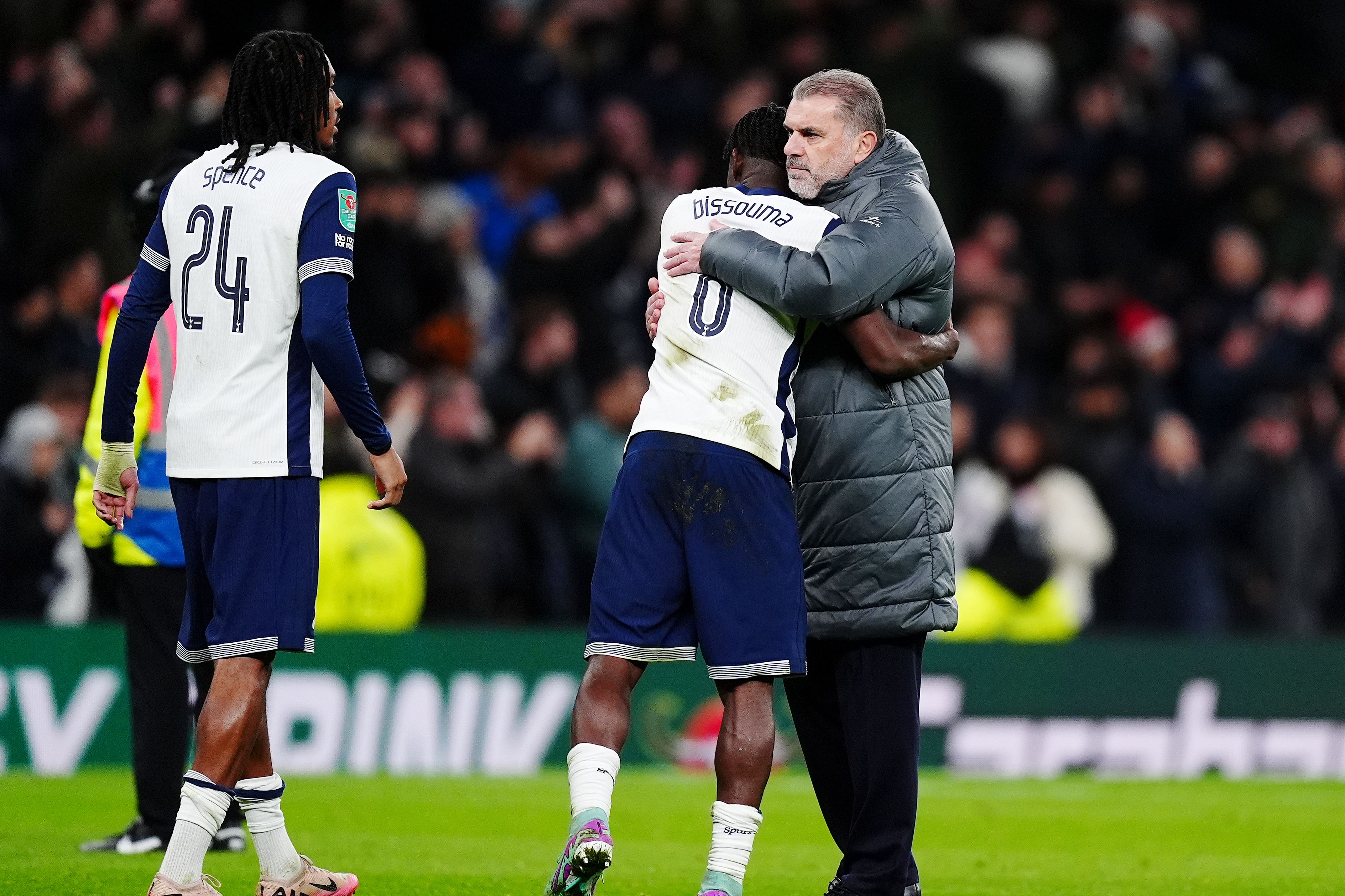 Tottenham Hotspur manager Ange Postecoglou (right) with Yves Bissouma and Djed Spence (left) after the Carabao Cup quarter-final match at the Tottenham Hotspur Stadium