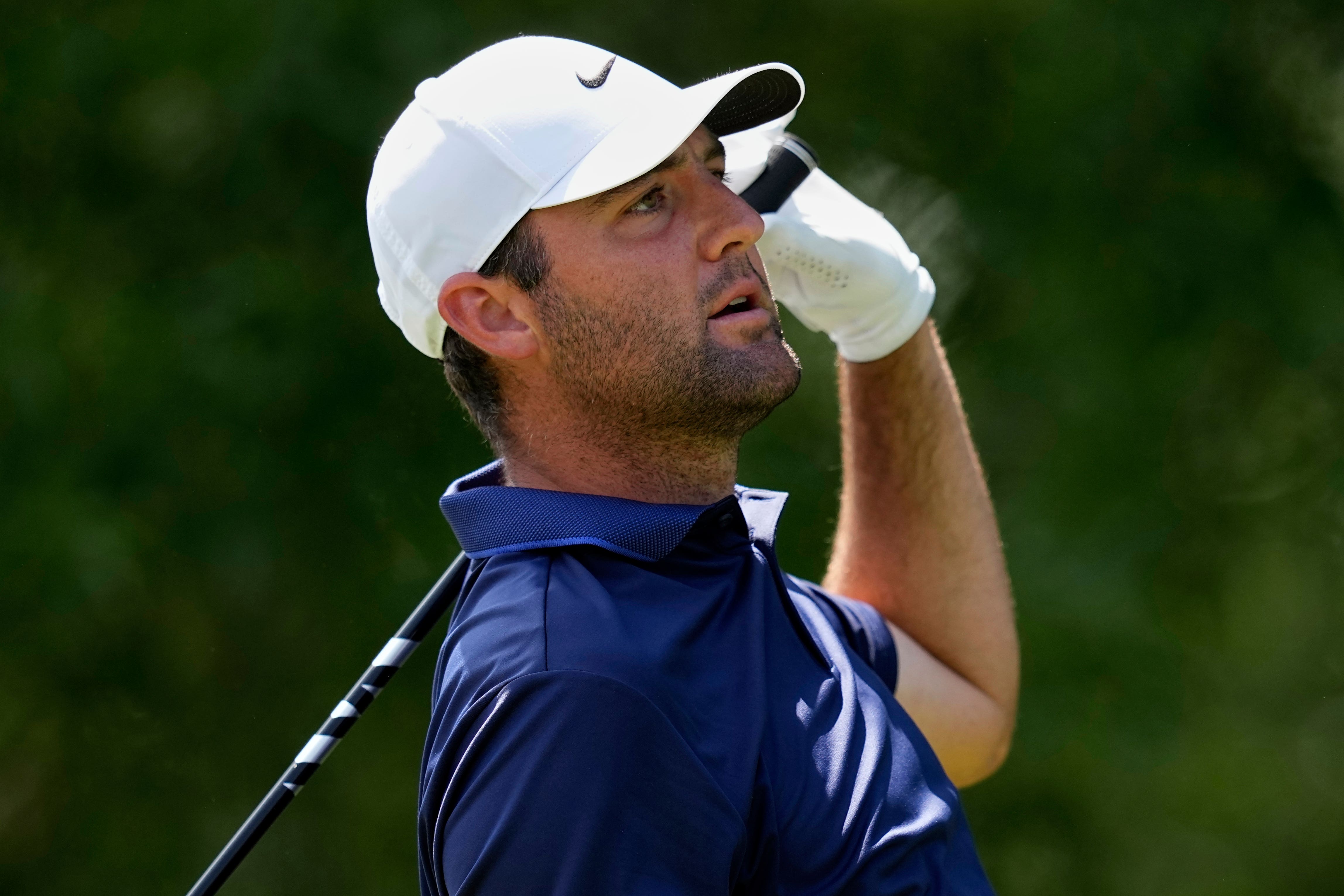 Scottie Scheffler watches his tee shot on the second hole during the final round of the US PGA Championship (David J. Phillip/AP)