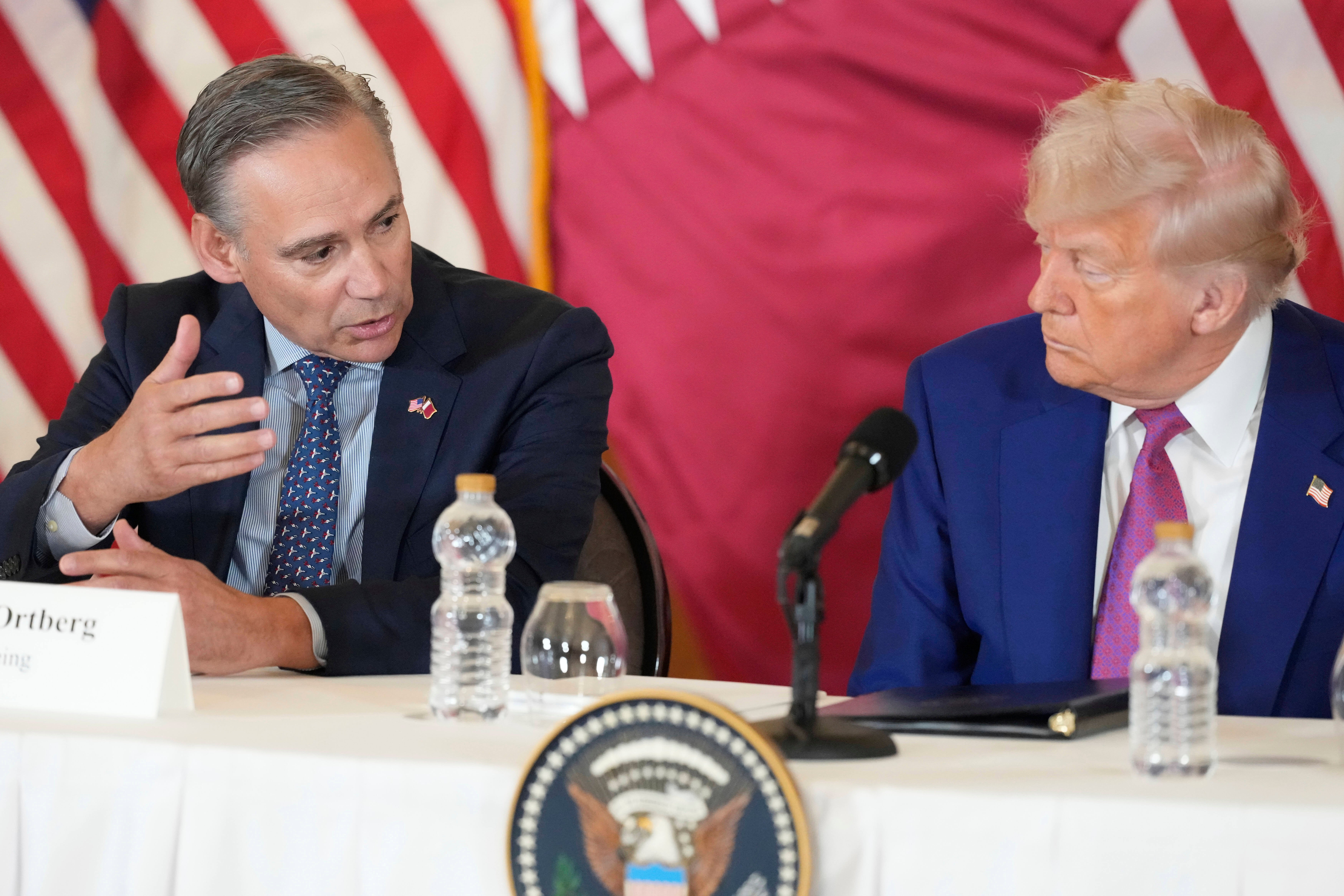 Kelly Ortberg, President and CEO of Boeing, next to President Donald Trump