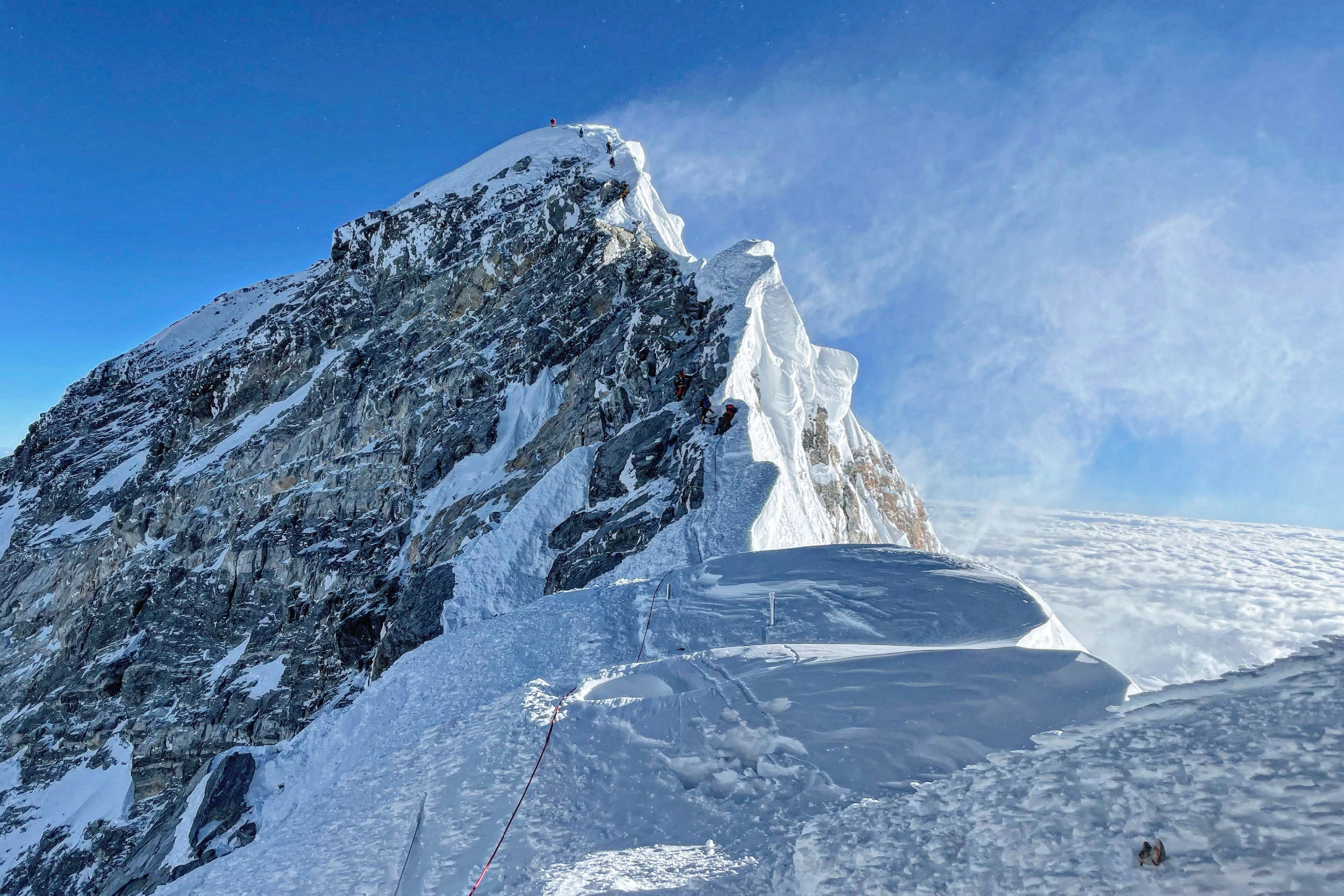 The British climbers, who had inhaled Xenon gas in Germany before embarking on the expedition, climbed the 8,848 metre (29,032 ft) peak in less than five days after departing London