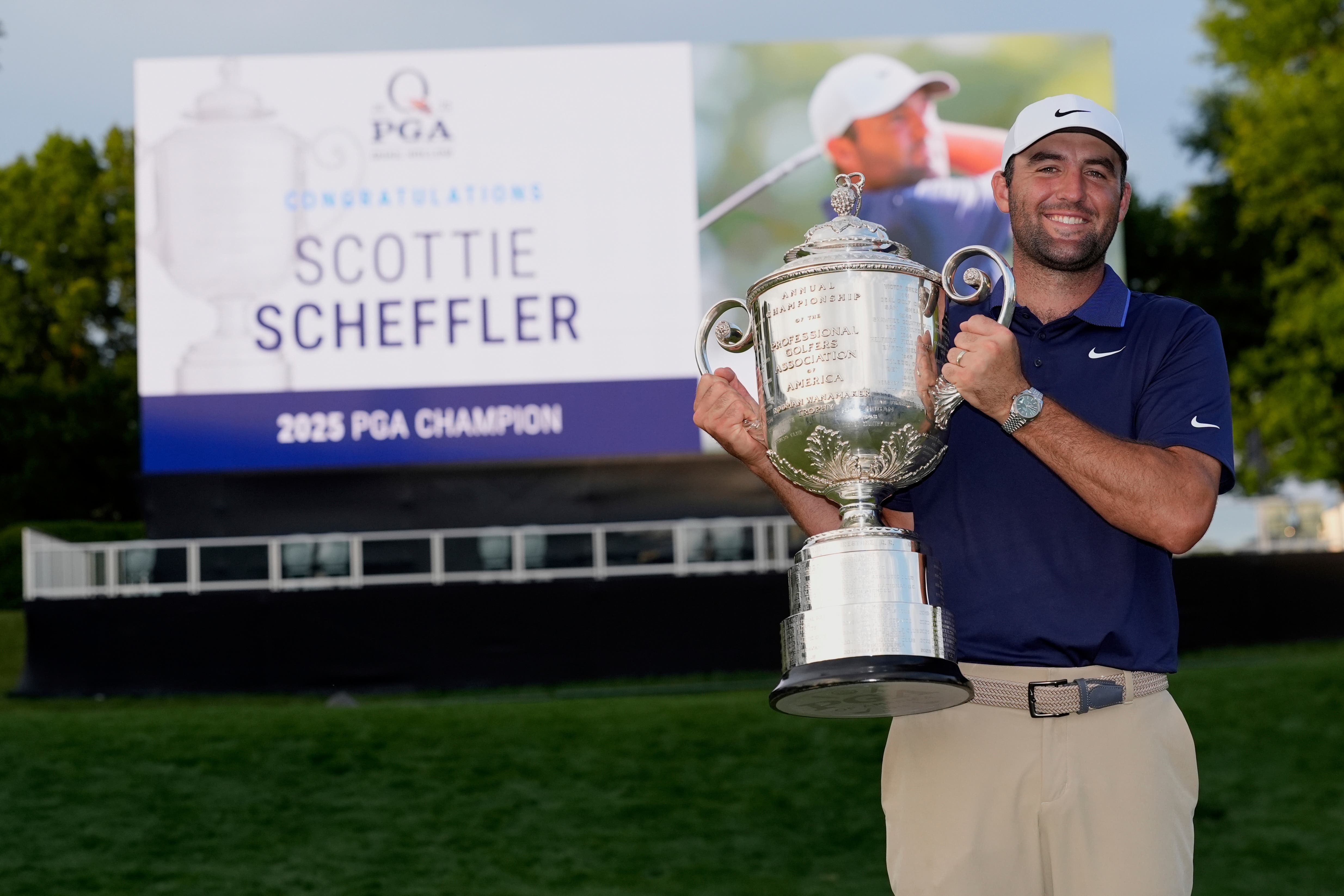 Scottie Scheffler poses with the Wanamaker trophy after winning the 107th US PGA Championship (David J. Phillip/AP)