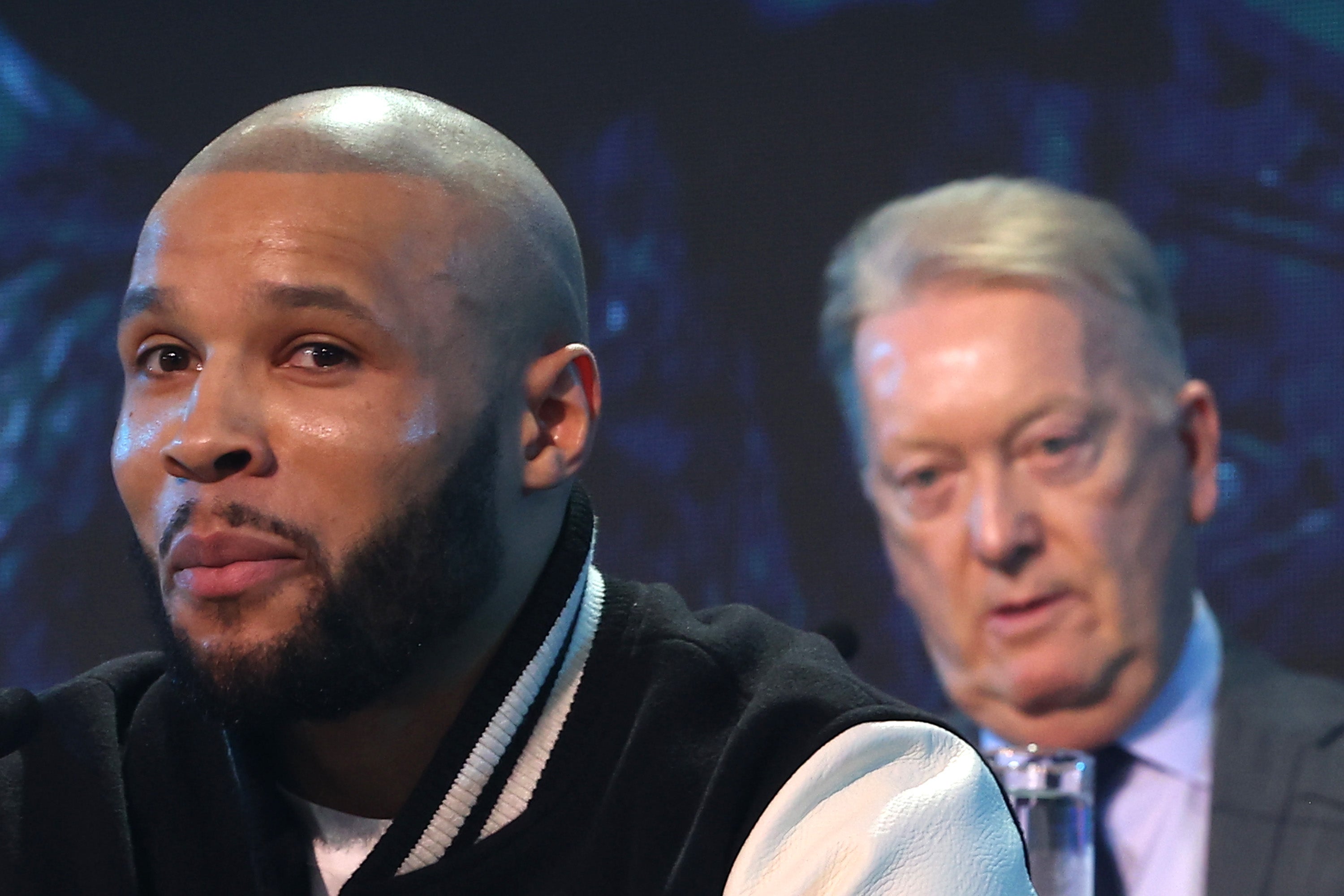 Chris Eubank Jr (left) and Frank Warren on stage at a press conference in September