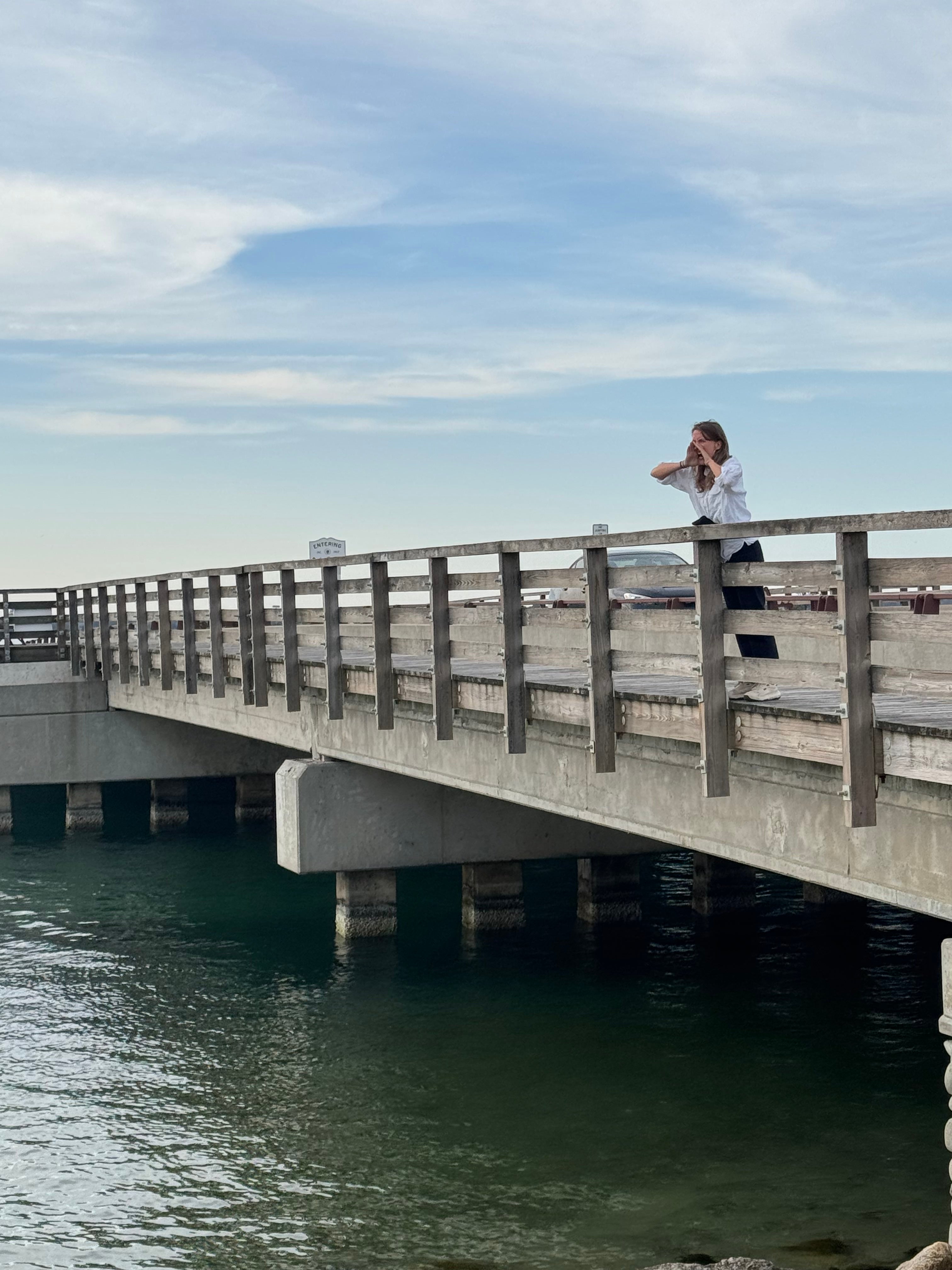 Robyn reenacts a scene from the film at 'Jaws Bridge'
