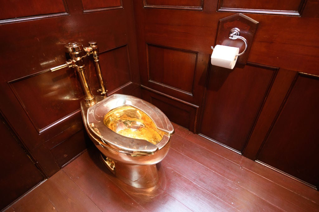 A solid gold toilet, created by artist Maurizio Cattelan