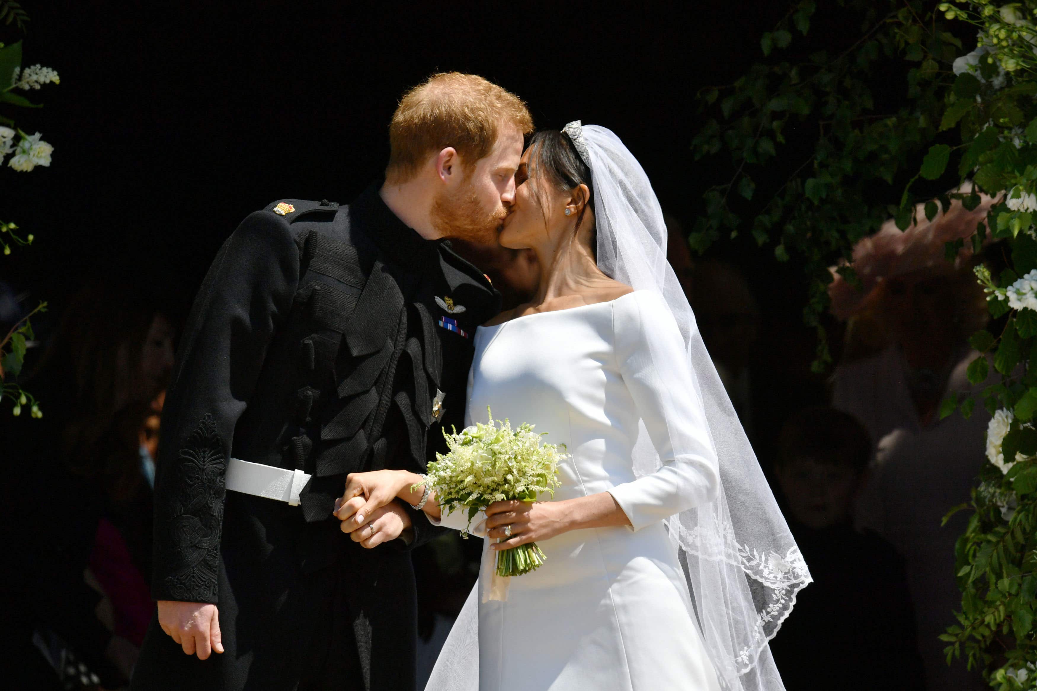 The Sussexes kiss on their wedding day in 2018 (Ben Birchall/PA)