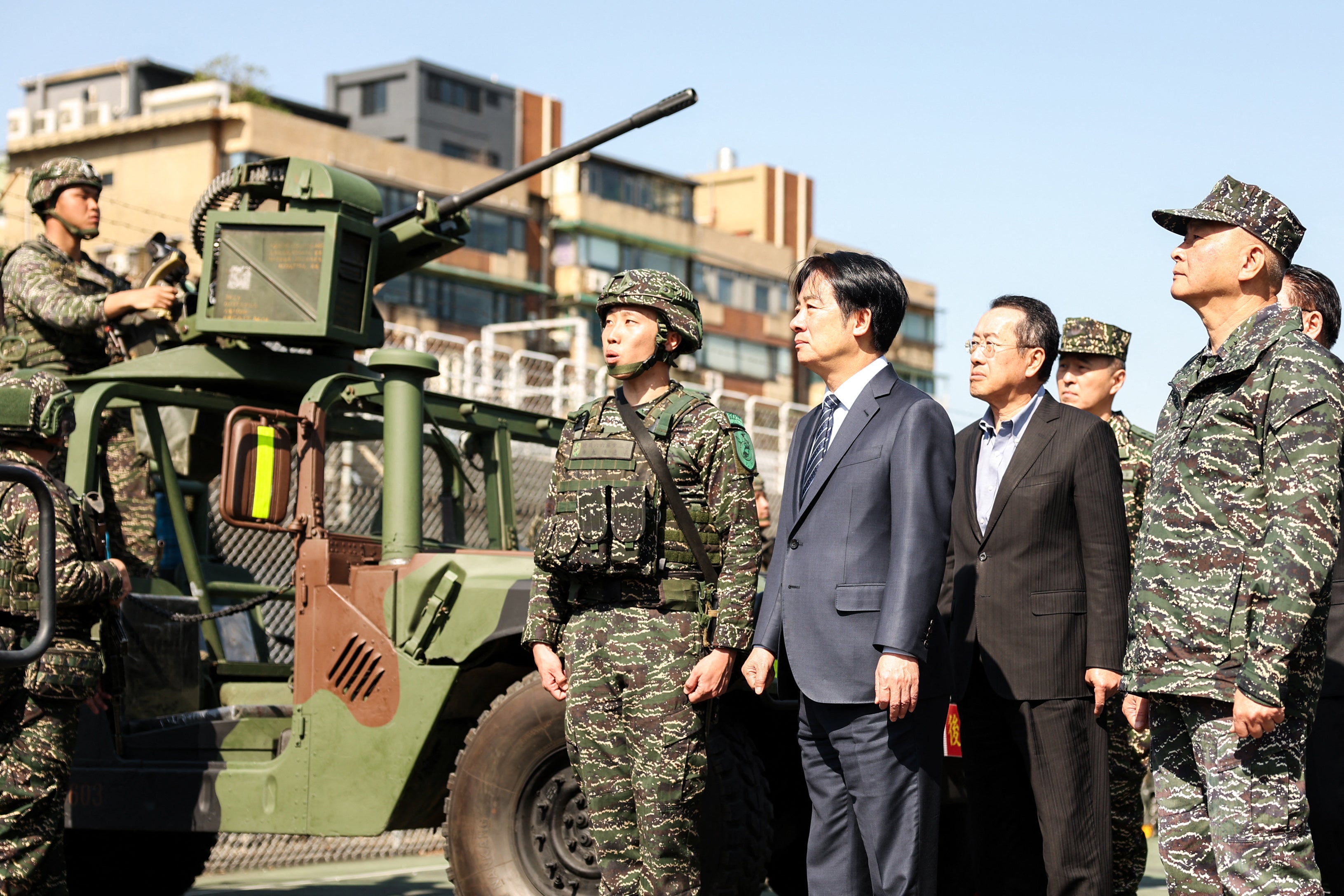 Lai Ching-te inspects the troops taking part in the Rapid Response Exercise during a visit at the Songshan military airbase in Taipei