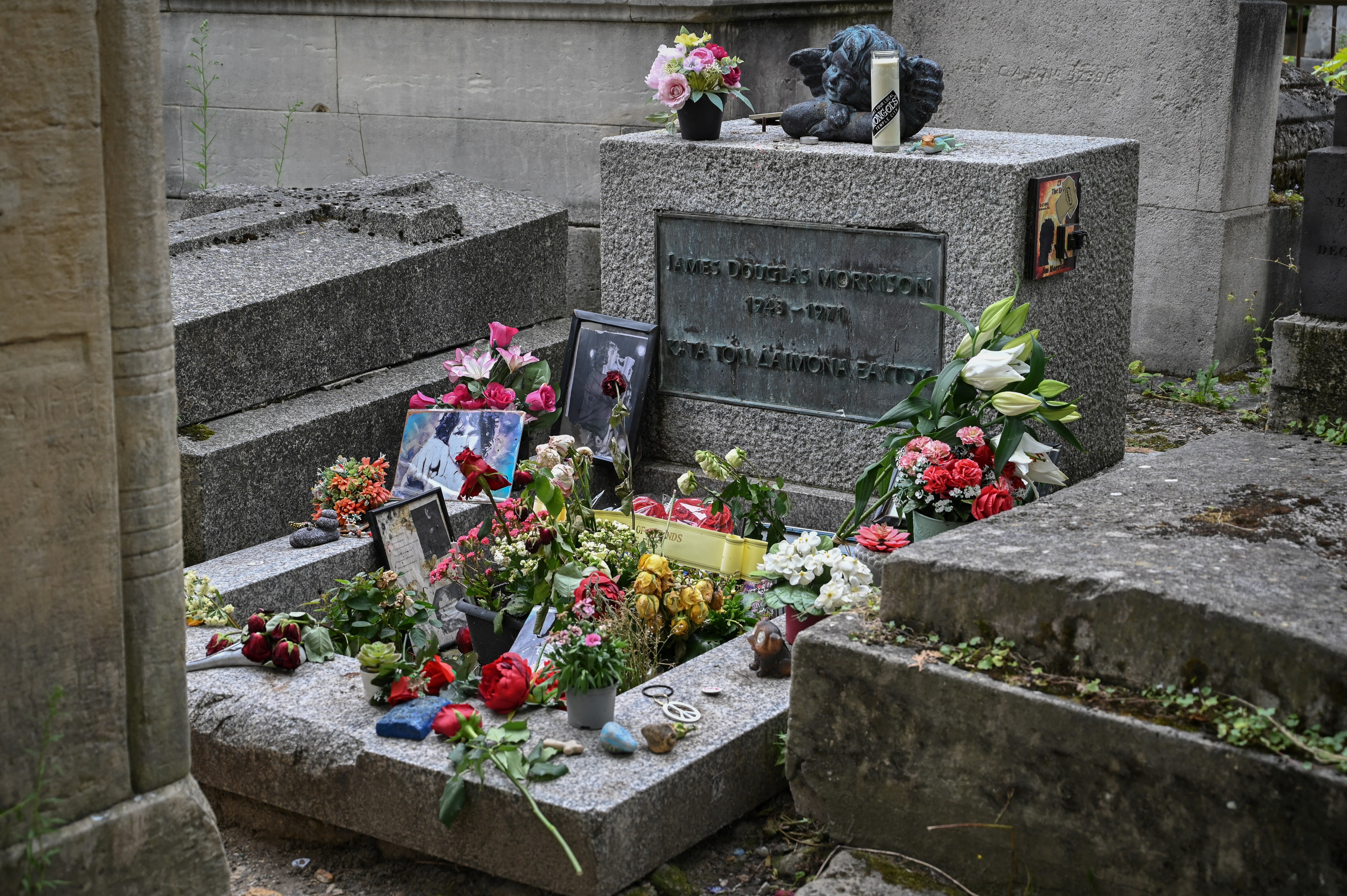 The tomb of Jim Morrison at the Pere Lachaise cemetery in Paris in August 2023